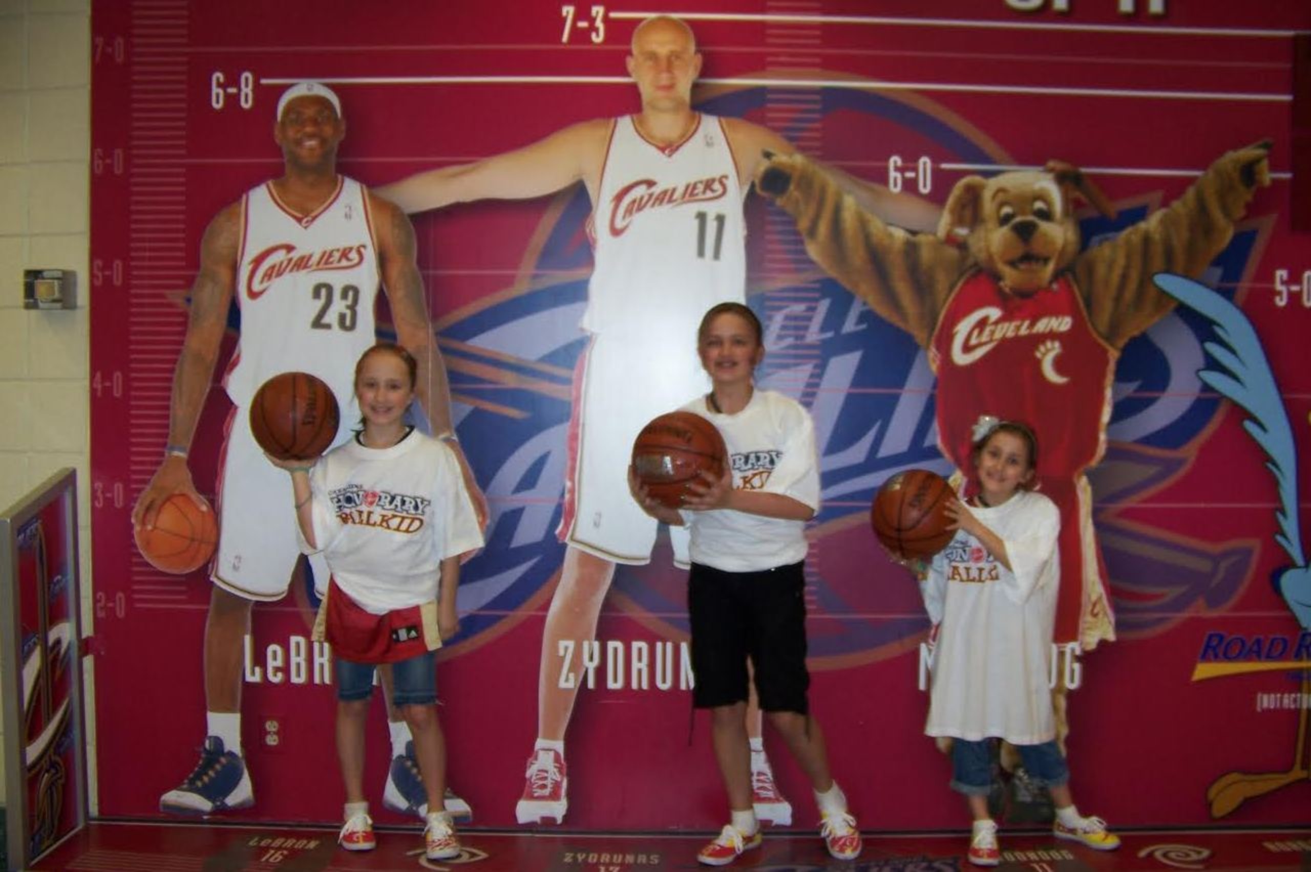 Sarah (left), Megan (middle) and Logan Bowers at Quicken Loans Arena in LeBron's final season in Cleveland before leaving for Miami.