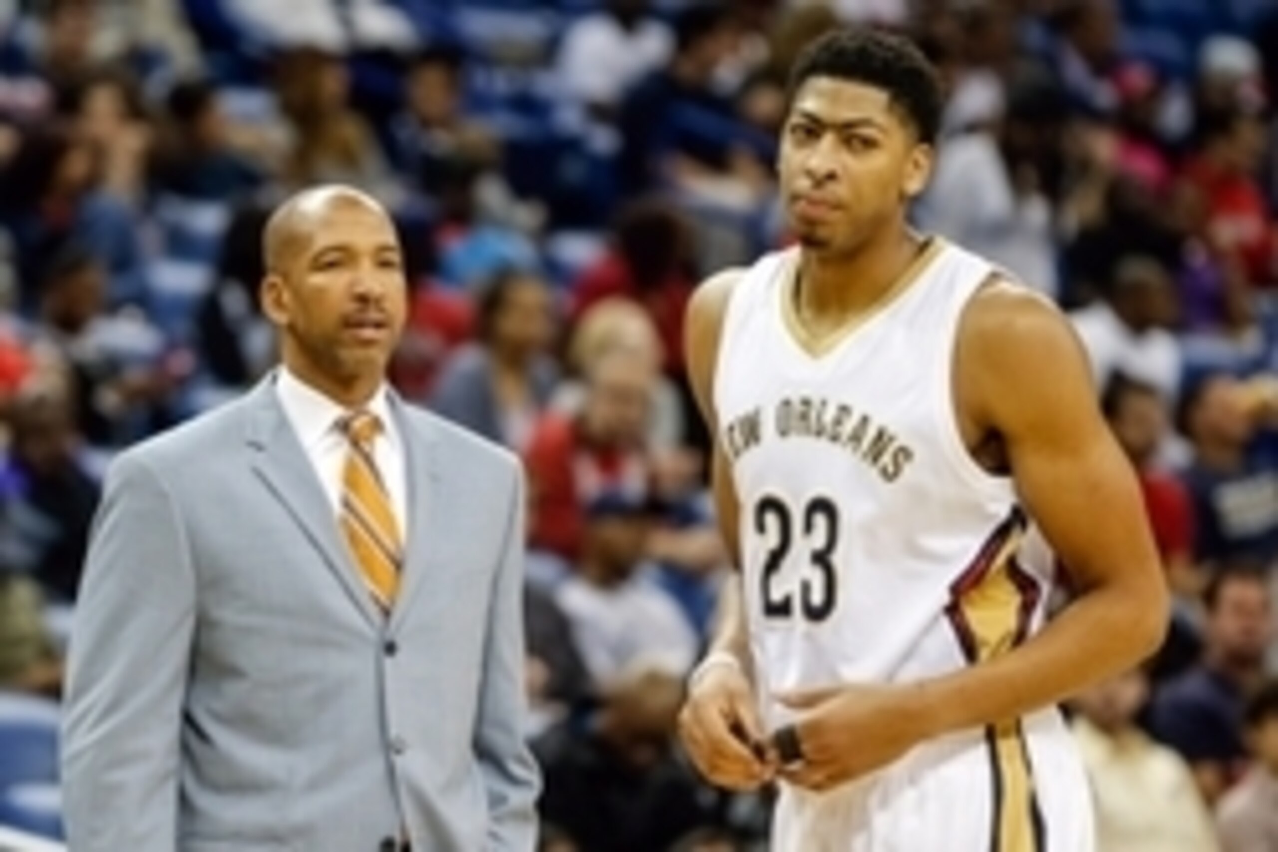 Oct 16, 2014; New Orleans, LA, USA; New Orleans Pelicans head coach Monty Williams talks with forward Anthony Davis (23) during the second quarter of a preseason game against the Oklahoma City Thunder at the Smoothie King Center. Mandatory Credit: Derick 