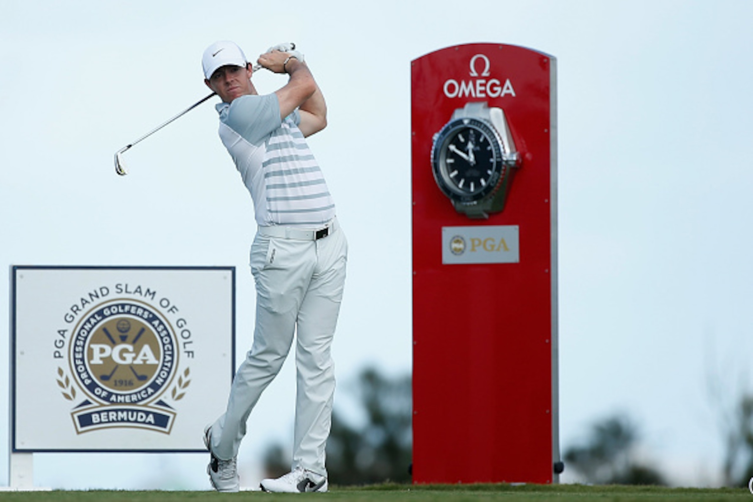 SOUTHAMPTON, BERMUDA - OCTOBER 15:  Rory McIlroy of Northern Ireland hits his tee shot on the tenth hole during the final day of the PGA Grand Slam of Golf at Port Royal Golf Course on October 15, 2014 in Southampton, Bermuda.  (Photo by Scott Halleran/Ge