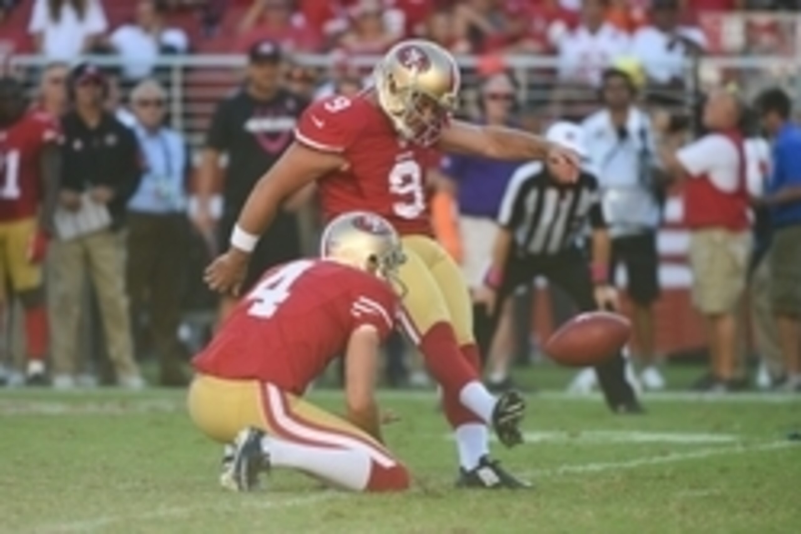 October 5, 2014; Santa Clara, CA, USA; San Francisco 49ers kicker Phil Dawson (9) kicks a field goal out of the hold by punter Andy Lee (4) during the fourth quarter against the Kansas City Chiefs at Levi's Stadium. The 49ers defeated the Chiefs 22-17. Ma