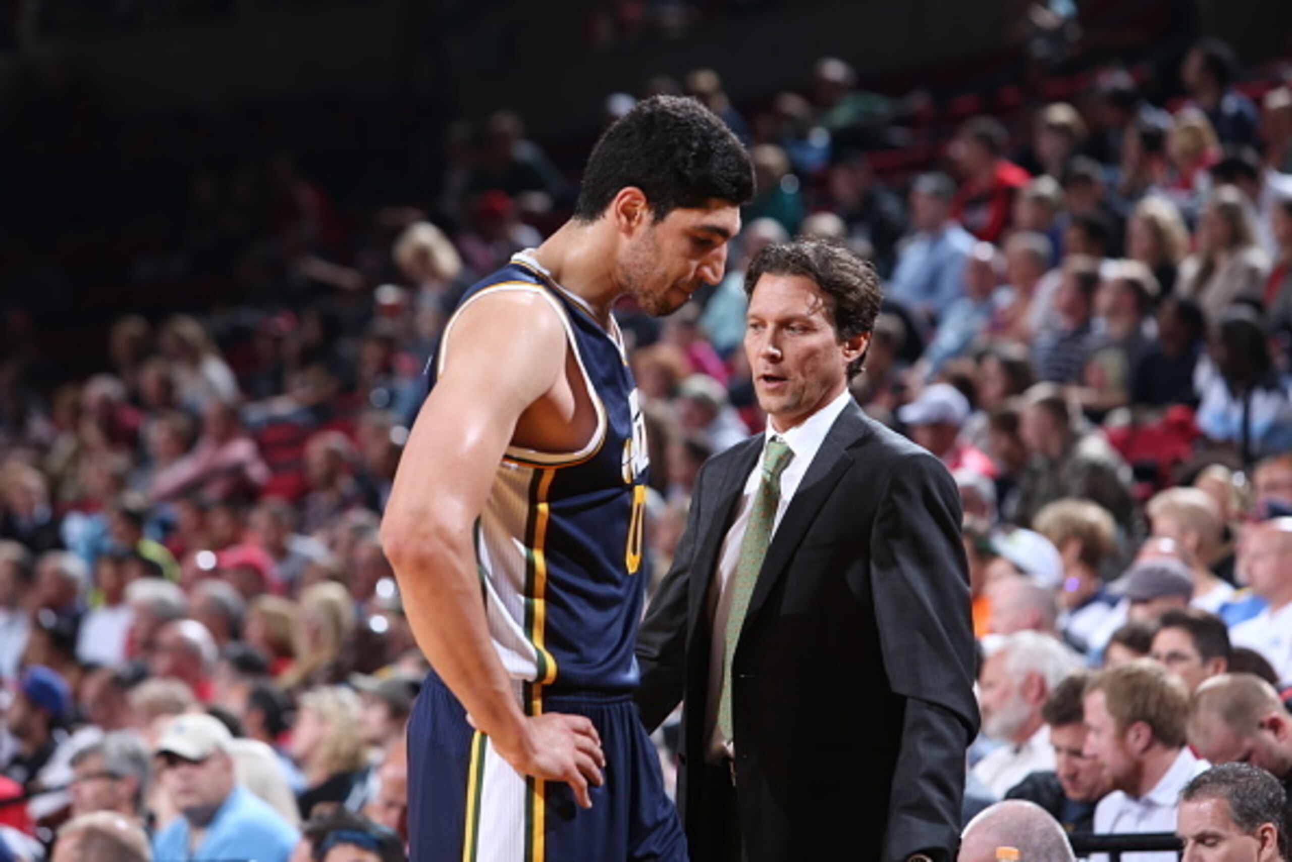 PORTLAND, OR - OCTOBER 9: Head coach Quin Snyder of the Utah Jazz talks with Enes Kanter #0 during the game against the Portland Trail Blazers on October 9, 2014 at the Moda Center Arena in Portland, Oregon. NOTE TO USER: User expressly acknowledges and PORTLAND, OR - OCTOBER 9: Head coach Quin Snyder of the Utah Jazz talks with Enes Kanter #0 during the game against the Portland Trail Blazers on October 9, 2014 at the Moda Center Arena in Portland, Oregon. NOTE TO USER: User expressly acknowledges and