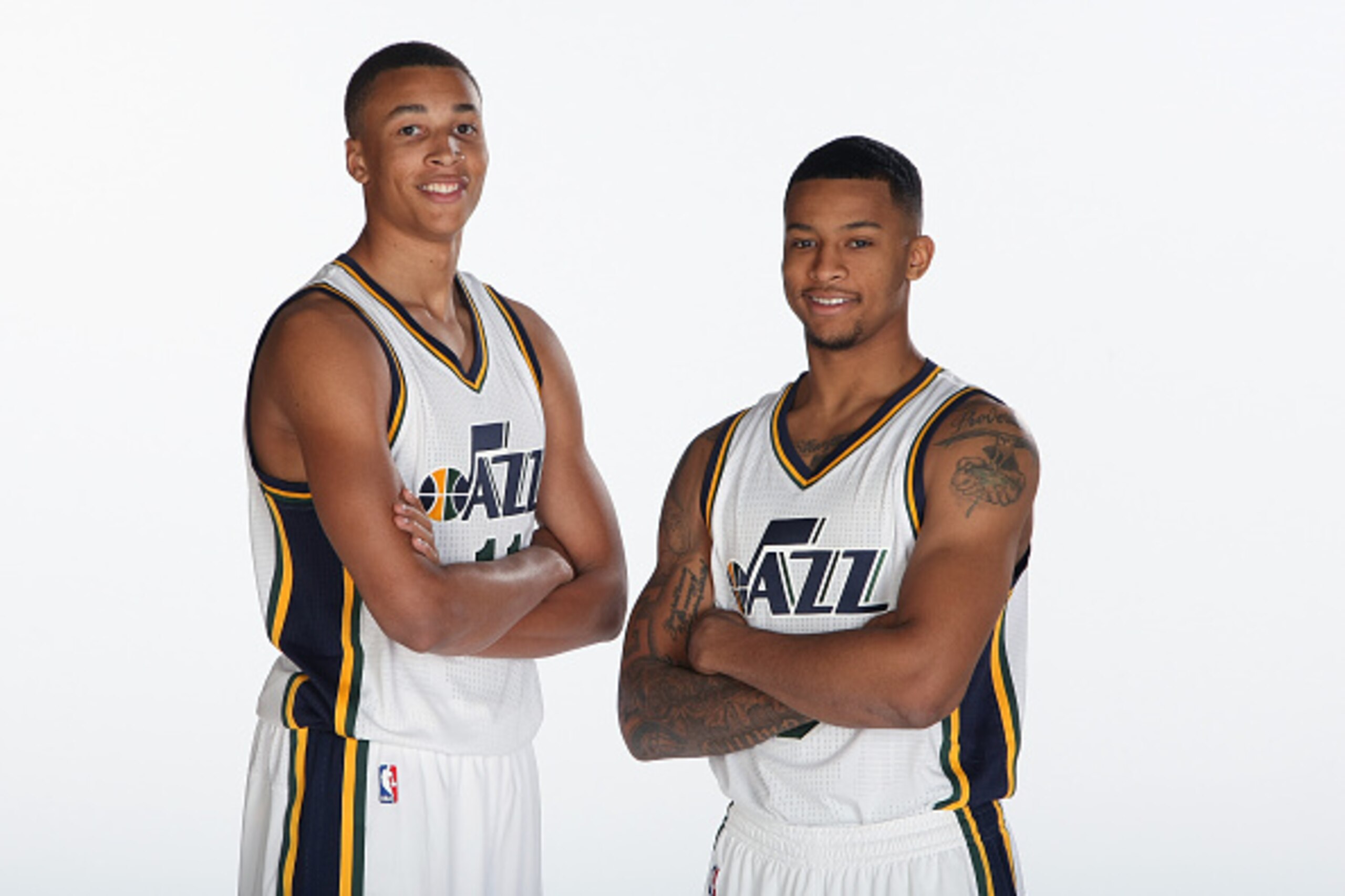 SALT LAKE CITY, UT - SEPTEMBER 29: (from left) Dante Exum #11 and Trey Burke #3 of the Utah Jazz pose for a photo during the 2014 NBA Jazz Media Day at Zions Basketball Center on September 29, 2014 in Salt Lake City, Utah. NOTE TO USER: User expressly ac SALT LAKE CITY, UT - SEPTEMBER 29: (from left) Dante Exum #11 and Trey Burke #3 of the Utah Jazz pose for a photo during the 2014 NBA Jazz Media Day at Zions Basketball Center on September 29, 2014 in Salt Lake City, Utah. NOTE TO USER: User expressly ac