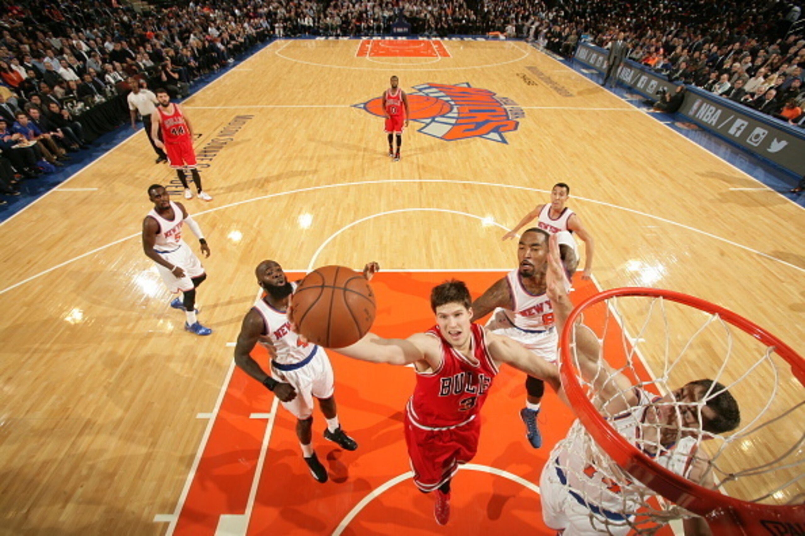 NEW YORK, NY - OCTOBER 29:  Doug McDermott #3 of the Chicago Bulls goes up for a lay up against the New York Knicks during a game at Madison Square Garden in New York City on October 29, 2014.  NOTE TO USER: User expressly acknowledges and agrees that, by