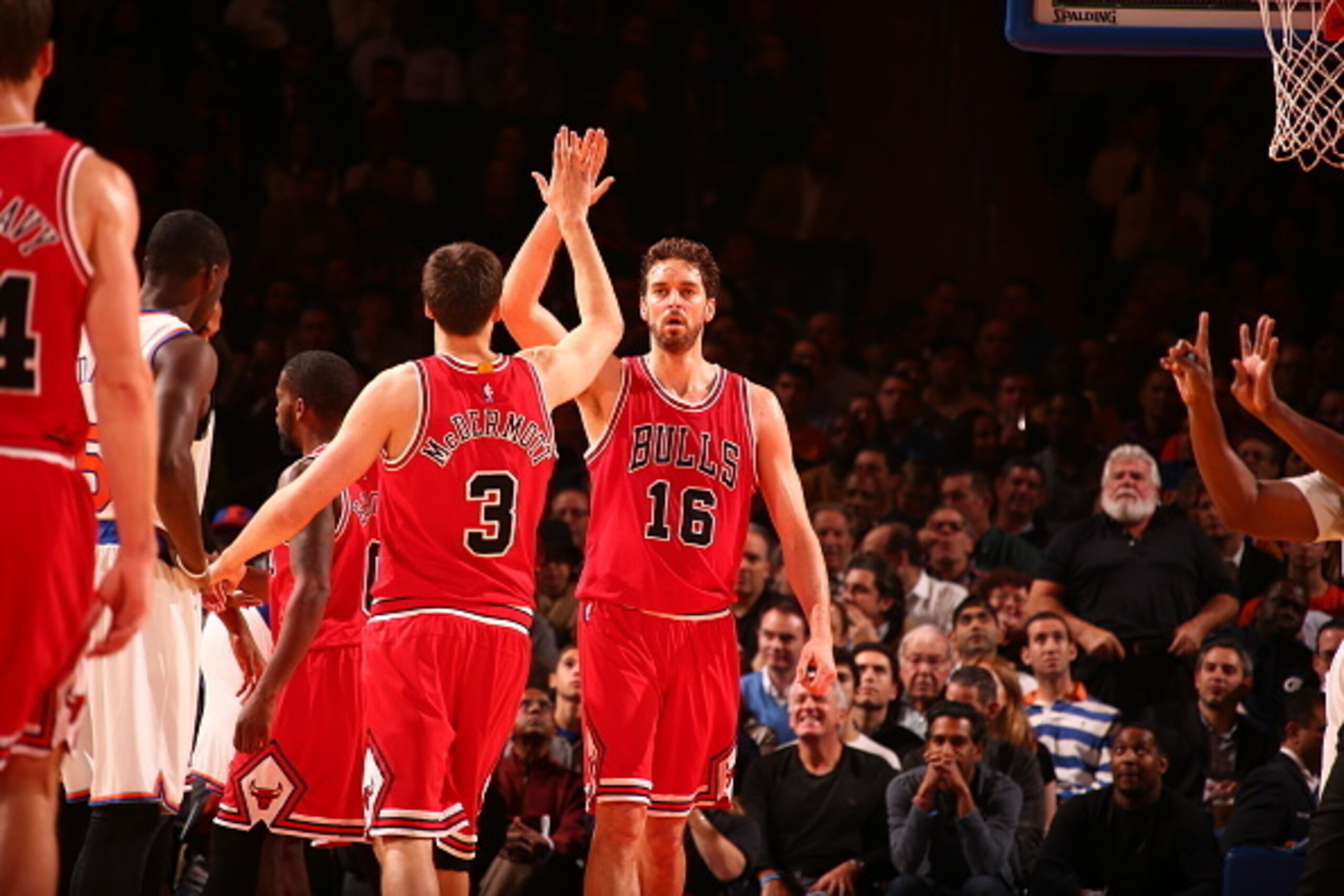 NEW YORK, NY - OCTOBER 29:  Pau Gasol #16 of the Chicago Bulls high fives teammates during a game against the New York Knicks at Madison Square Garden in New York City on October 29, 2014.  NOTE TO USER: User expressly acknowledges and agrees that, by dow