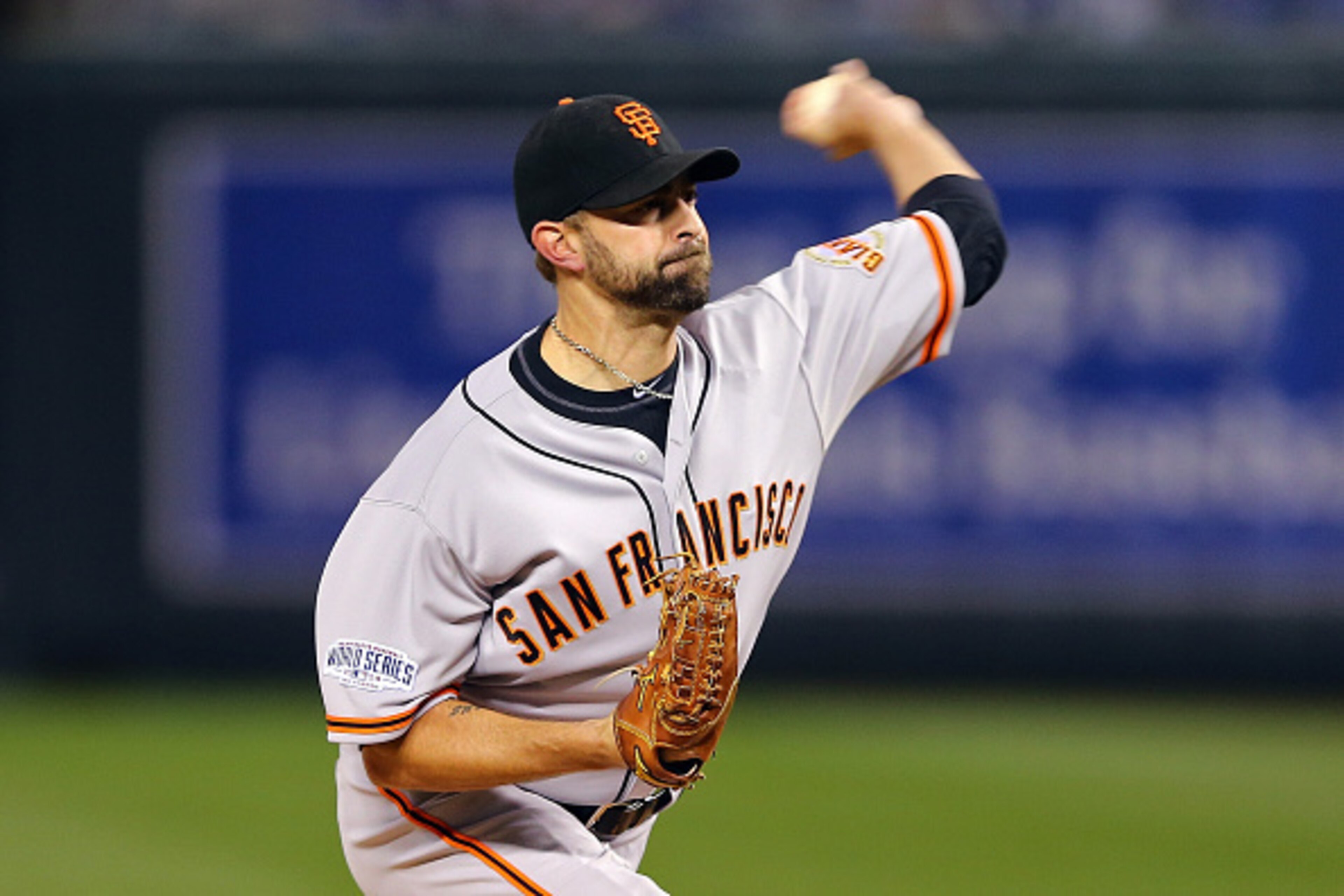 KANSAS CITY, MO - OCTOBER 29: Jeremy Affeldt #41 of the San Francisco Giants pitches against the Kansas City Royals during Game Seven of the 2014 World Series at Kauffman Stadium on October 29, 2014 in Kansas City, Missouri.  (Photo by Elsa/Getty Images)