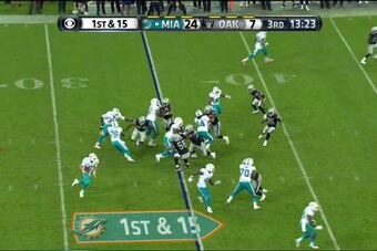 Tannehill fakes the handoff to Miller, and Clay is his escort up the field.
