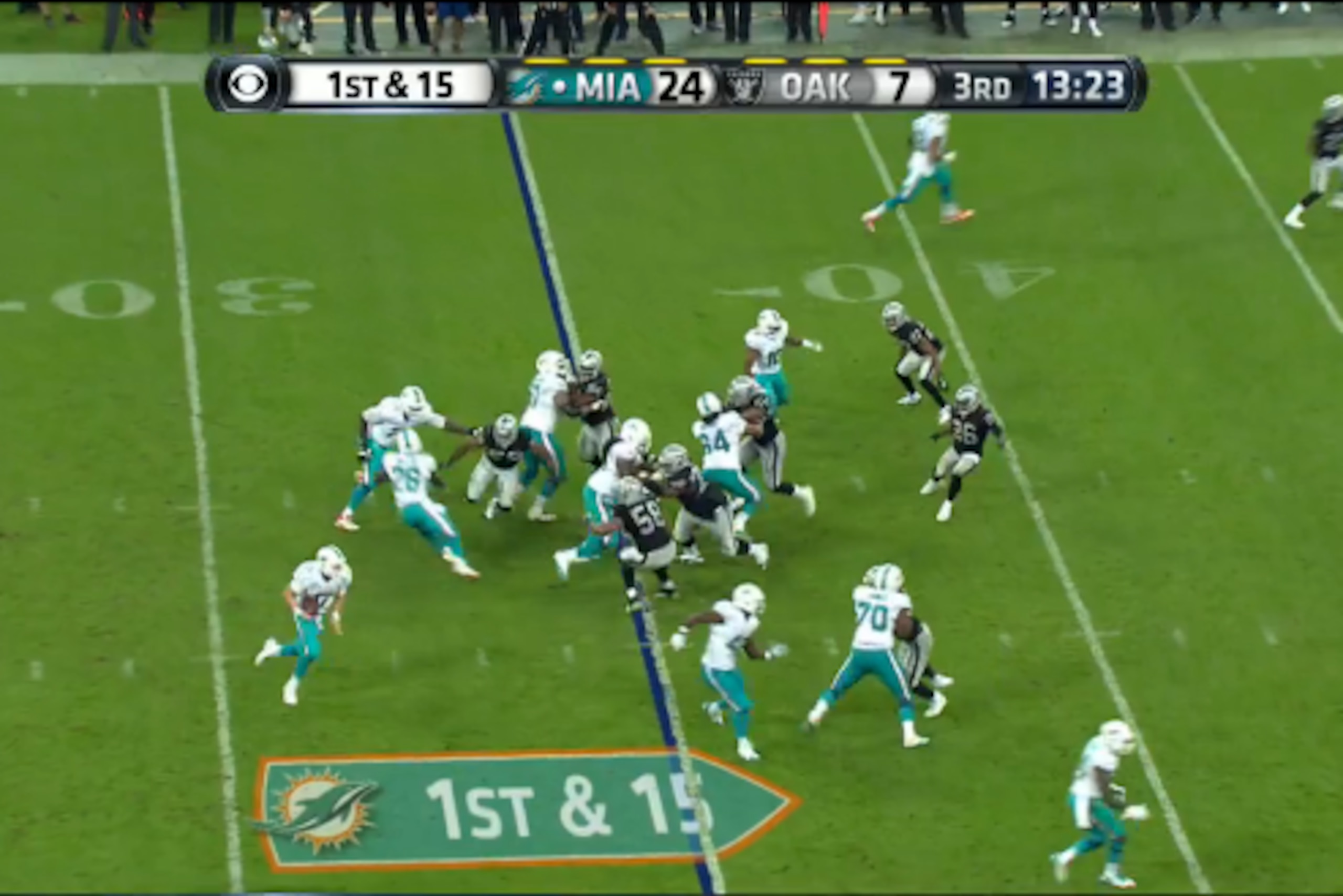 Tannehill fakes the handoff to Miller, and Clay is his escort up the field.