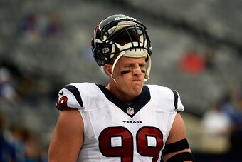 EAST RUTHERFORD, NJ - SEPTEMBER 21:  J.J. Watt #99 of the Houston Texans looks on during warm ups prior to their game against the New York Giants at MetLife Stadium on September 21, 2014 in East Rutherford, New Jersey.  (Photo by Alex Goodlett/Getty Image