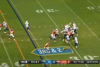 With the Broncos collapsing the pocket, Rivers throws to Allen, who has plenty of room to run.