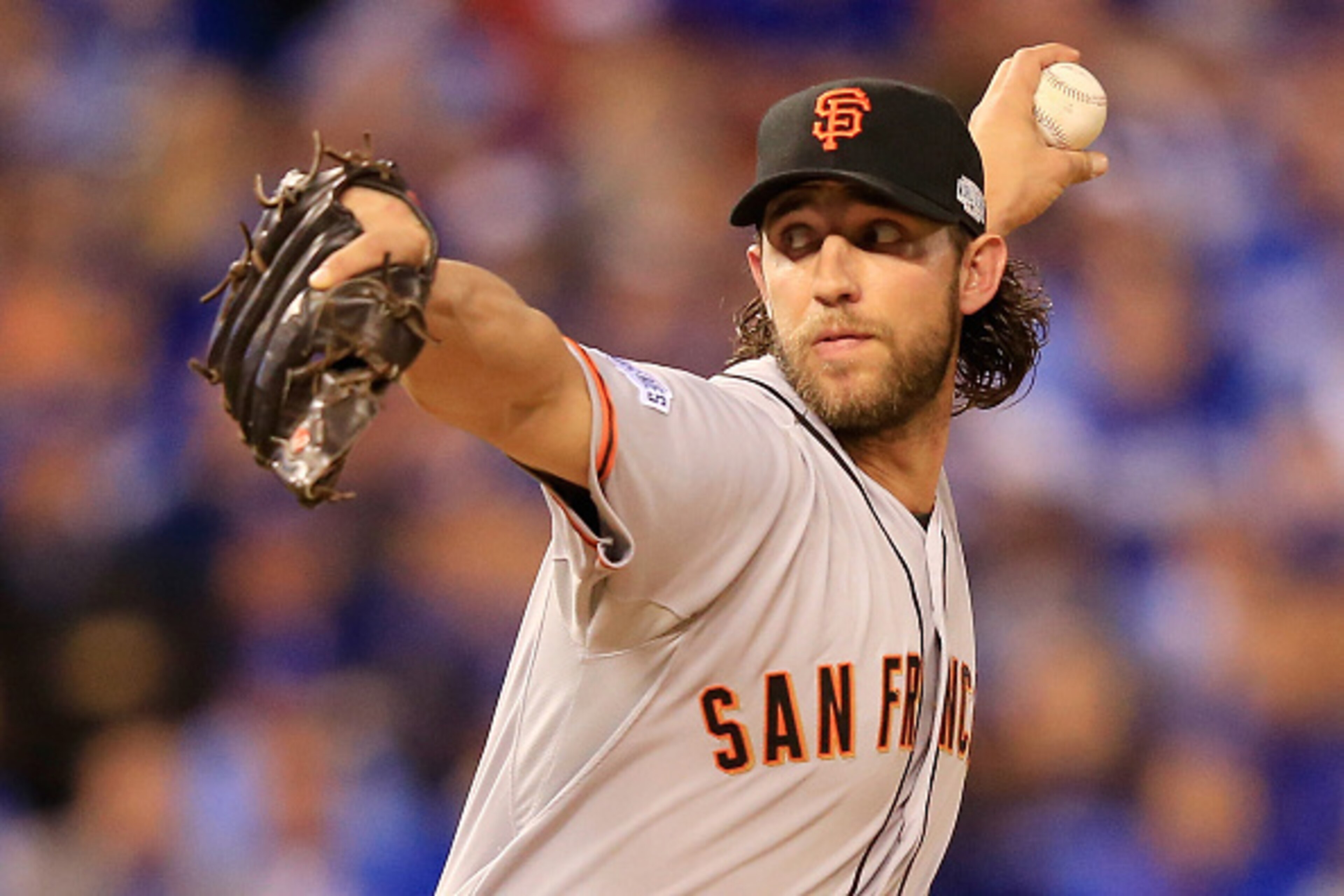 KANSAS CITY, MO - OCTOBER 29:  Madison Bumgarner #40 of the San Francisco Giants pitches against the Kansas City Royals in the fifth inning during Game Seven of the 2014 World Series at Kauffman Stadium on October 29, 2014 in Kansas City, Missouri.  (Phot