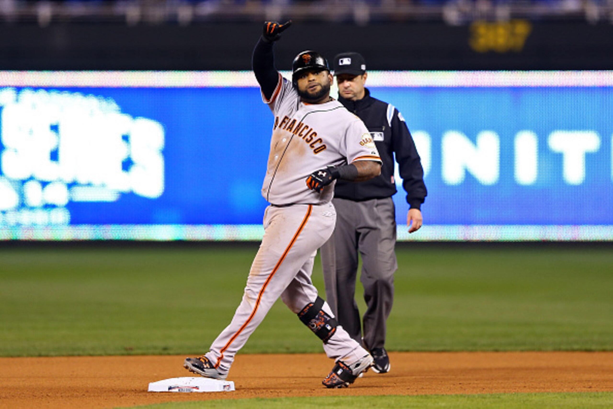 KANSAS CITY, MO - OCTOBER 29:  Pablo Sandoval #48 of the San Francisco Giants reacts against the Kansas City Royals during Game Seven of the 2014 World Series at Kauffman Stadium on October 29, 2014 in Kansas City, Missouri.  (Photo by Elsa/Getty Images)