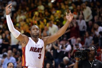 Oct 29, 2014; Miami, FL, USA; Miami Heat guard Dwyane Wade (3) cheers on the fans before tip off against the Washington Wizards at American Airlines Arena. Mandatory Credit: Steve Mitchell-USA TODAY Sports
