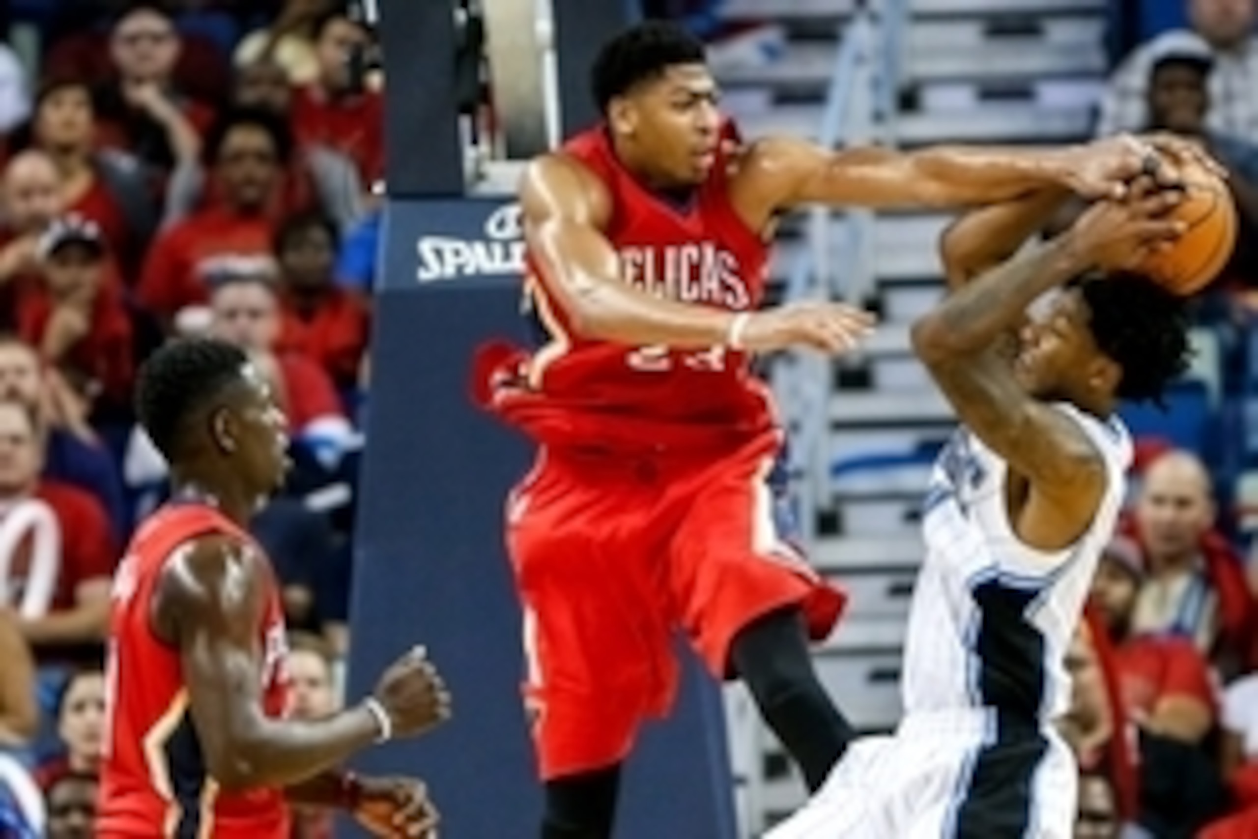 Oct 28, 2014; New Orleans, LA, USA; New Orleans Pelicans forward Anthony Davis (23) blocks a shot by Orlando Magic guard Elfrid Payton (4) during the second quarter of a game at the Smoothie King Center. Mandatory Credit: Derick E. Hingle-USA TODAY Sports