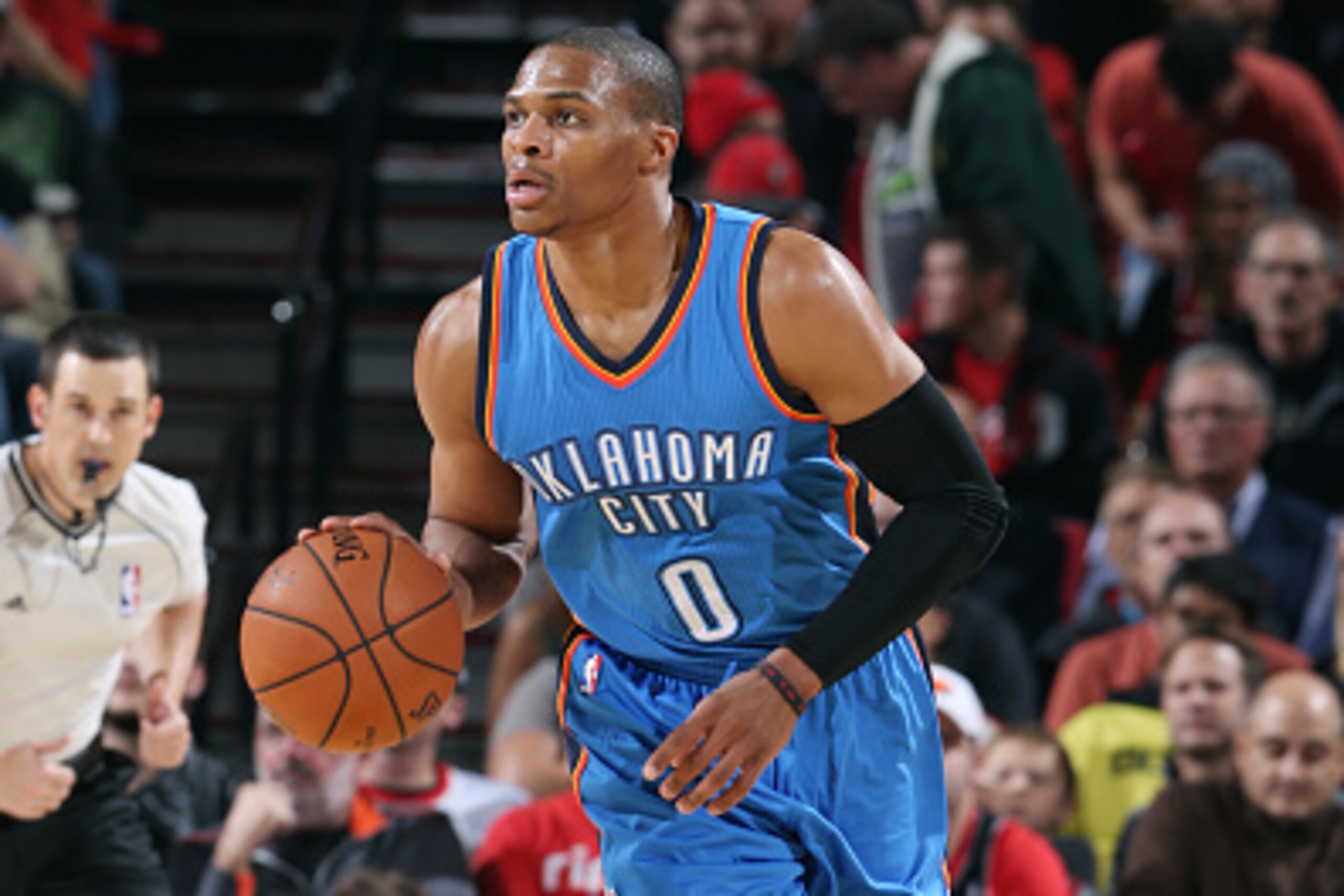 PORTLAND, OR - OCTOBER 29: Russell Westbrook #0 of the Oklahoma City Thunder drives against the Portland Trail Blazers on October 29, 2014 in Portland, OR. NOTE TO USER: User expressly acknowledges and agrees that, by downloading and/or using this photogr