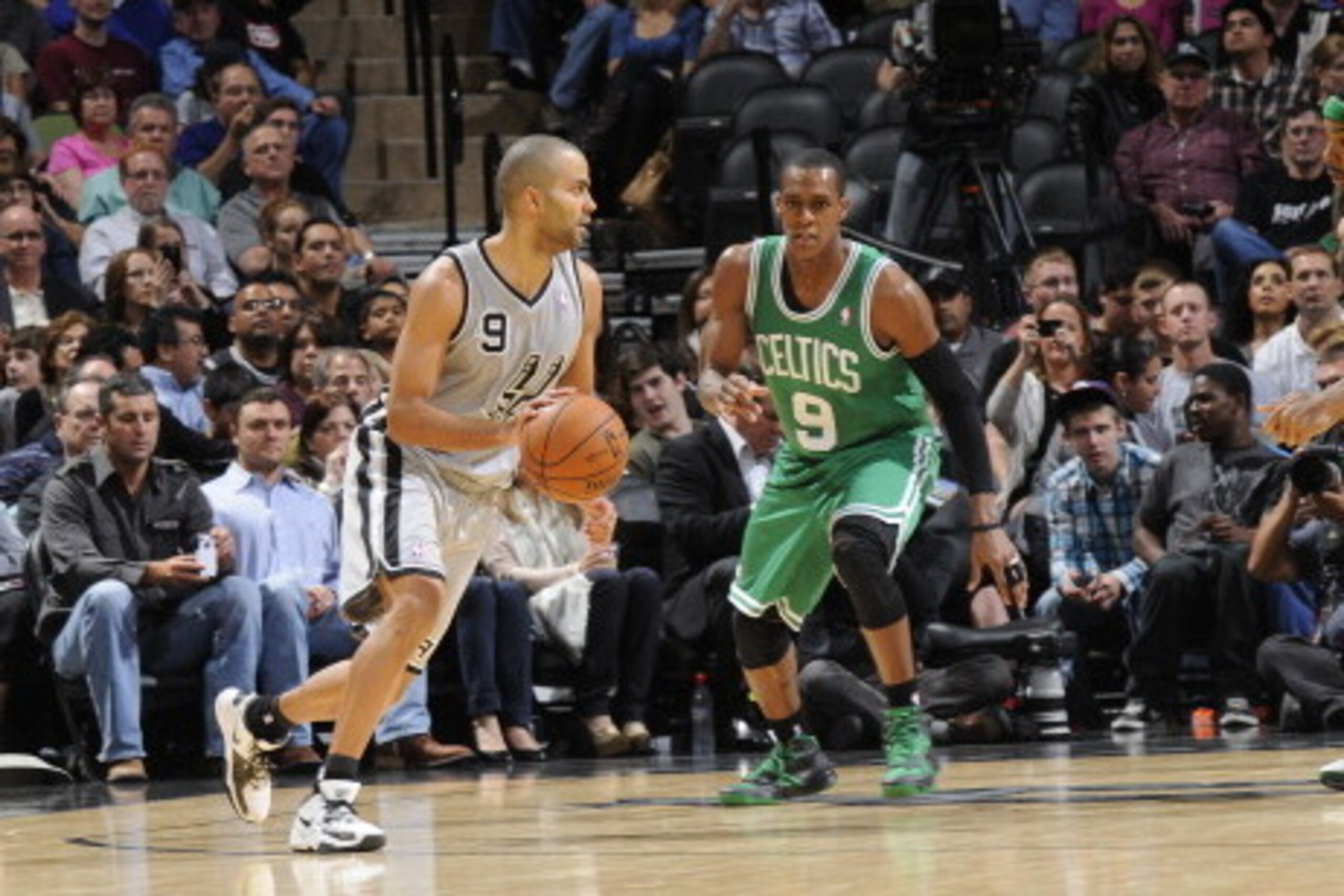 SAN ANTONIO, TX - DECEMBER 15:  Tony Parker #9 of the San Antonio Spurs drives against Rajon Rondo #9 of the Boston Celtics during the game between the Boston Celtics and the San Antonio Spurs on December 15, 2012 at the AT&T Center in San Antonio, Texas.