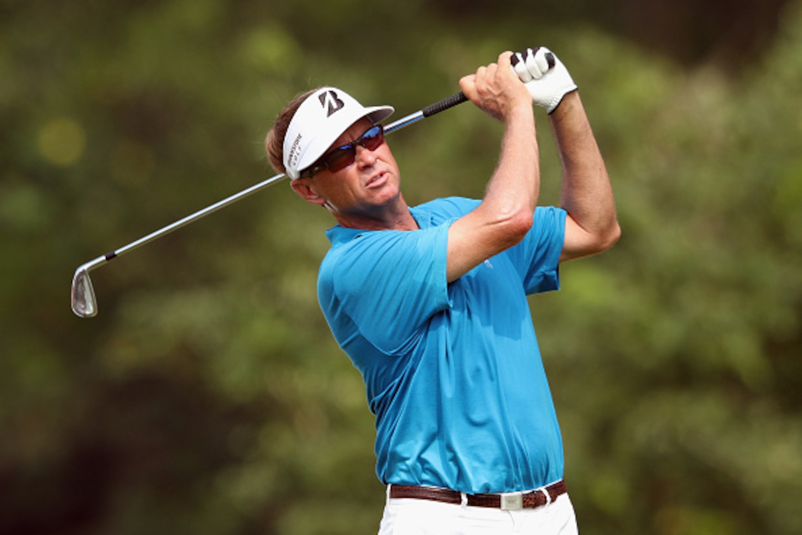 KUALA LUMPUR, MALAYSIA - OCTOBER 30: Davis Love lll of United States plays a tee shot on the 7th hole during day one of the 2014 CIMB Classic at Kuala Lumpur Golf & Country Club on October 30, 2014 in Kuala Lumpur, Malaysia.  (Photo by Stanley Chou/Getty 