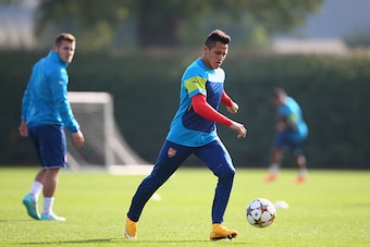 ST ALBANS, ENGLAND - SEPTEMBER 30:  Alexis Sanchez of Arsenal in action during an Arsenal training session ahead of their UEFA Champions League Group D match against Galatasaray at London Colney on September 30, 2014 in St Albans, England.  (Photo by Paul