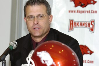 Soon after Malzahn joined Houston Nutt's staff at Arkansas, Freeze joined his friend in the SEC with an assistant coach position at Ole Miss.