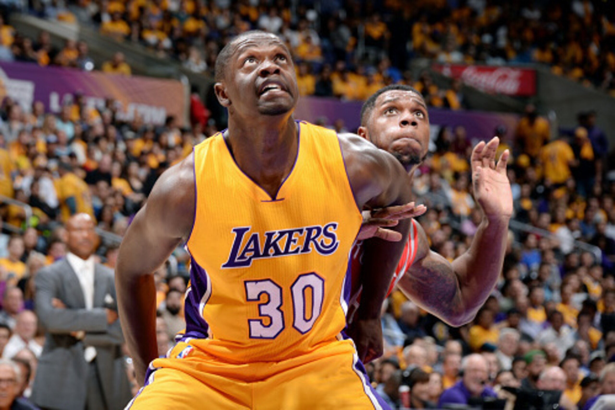 LOS ANGELES, CA - OCTOBER 28: Julius Randle #30 of the Los Angeles Lakers battles for position against the Houston Rockets on October 28, 2014 at the Staples Center in Los Angeles, California. NOTE TO USER: User expressly acknowledges and agrees that, by LOS ANGELES, CA - OCTOBER 28: Julius Randle #30 of the Los Angeles Lakers battles for position against the Houston Rockets on October 28, 2014 at the Staples Center in Los Angeles, California. NOTE TO USER: User expressly acknowledges and agrees that, by