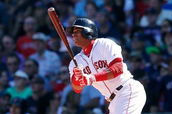 BOSTON, MA - SEPTEMBER 7:  Yoenis Cespedes #52 of the Boston Red Sox watches the flight of his ball against the Toronto Blue Jays in the third inning at Fenway Park on September 7, 2014 in Boston, Massachusetts.  (Photo by Jim Rogash/Getty Images)