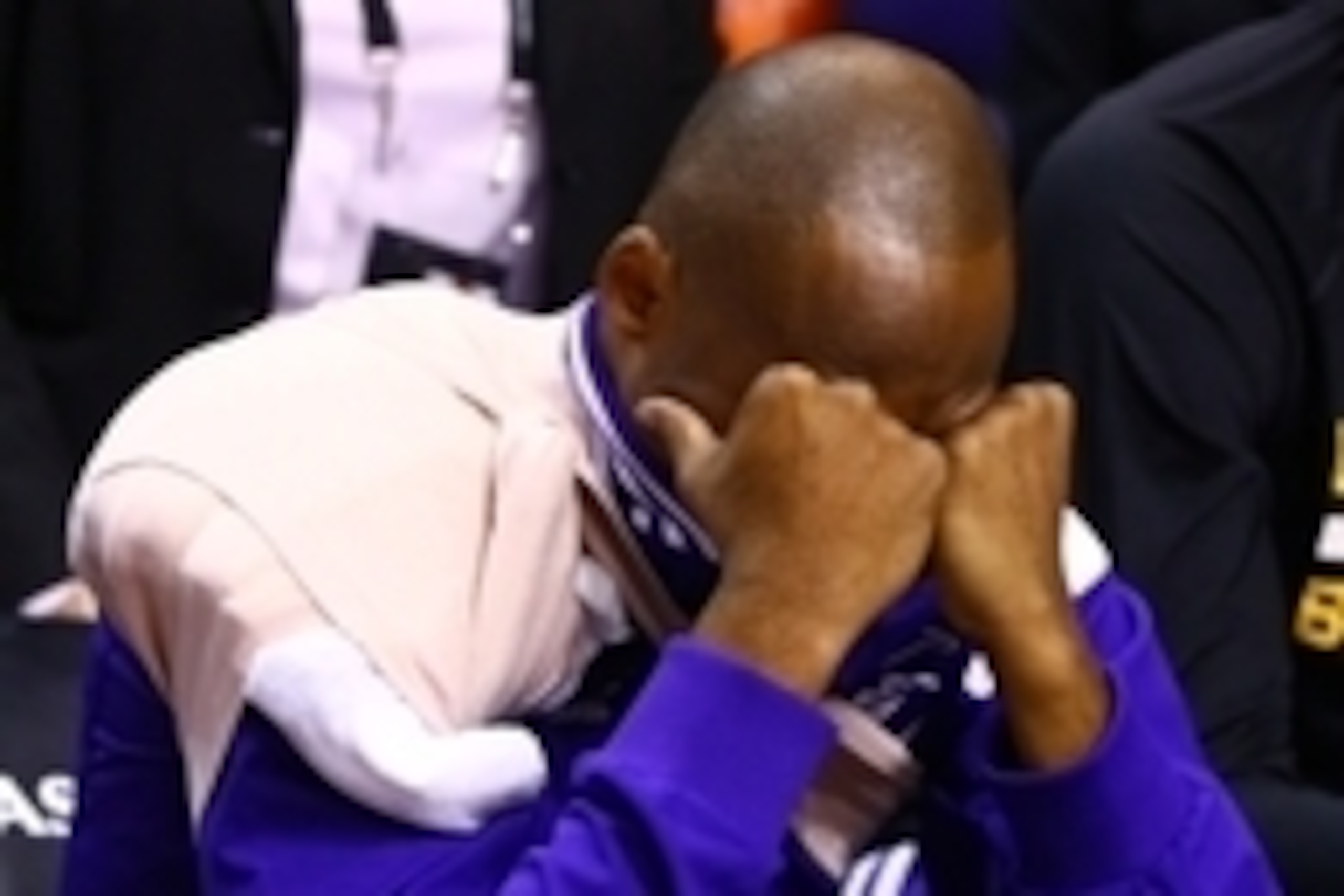 Oct 29, 2014; Phoenix, AZ, USA; Los Angeles Lakers guard Kobe Bryant reacts as he wears an ice pack on his right shoulder as he sits on the bench prior to the game against the Phoenix Suns during the home opener at US Airways Center. The Suns defeated the Oct 29, 2014; Phoenix, AZ, USA; Los Angeles Lakers guard Kobe Bryant reacts as he wears an ice pack on his right shoulder as he sits on the bench prior to the game against the Phoenix Suns during the home opener at US Airways Center. The Suns defeated the