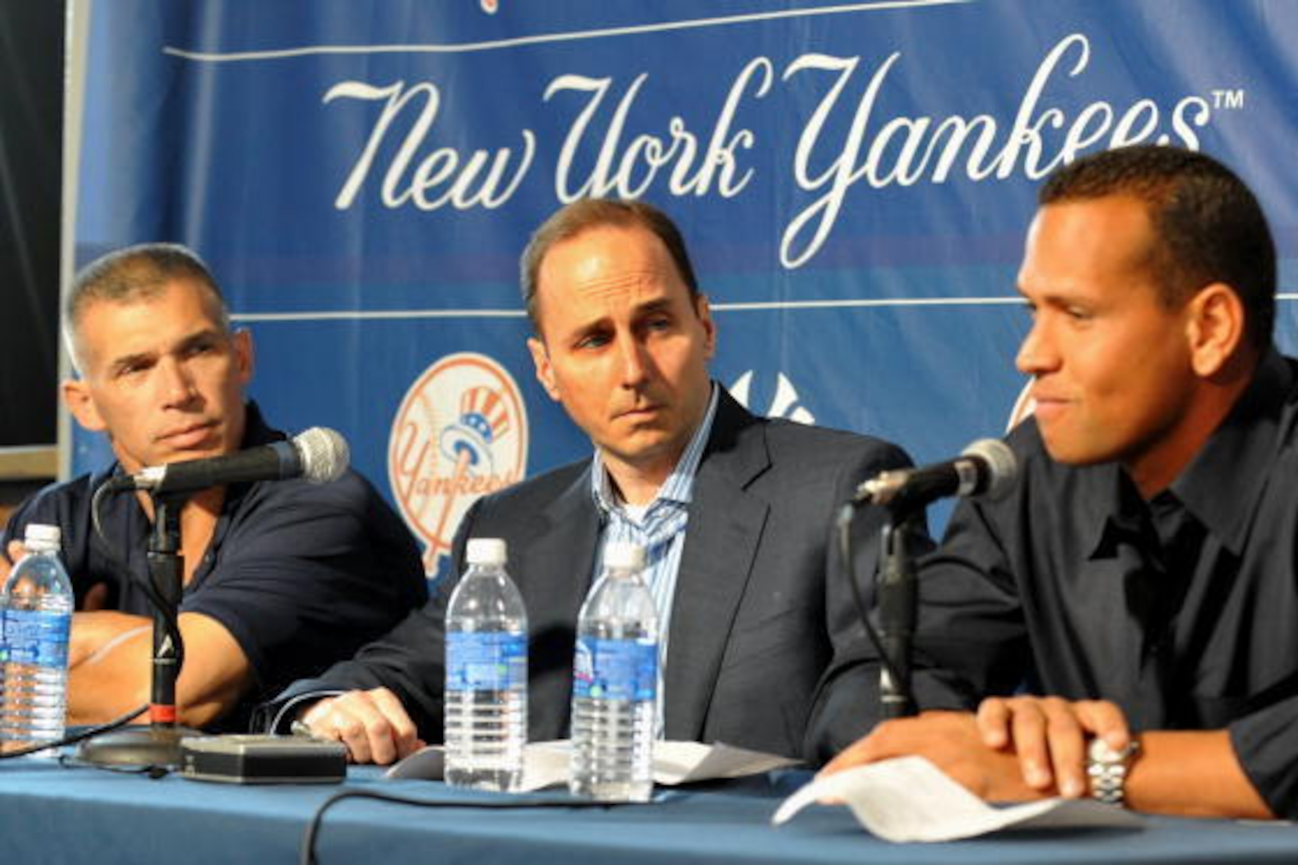 TAMPA - FEBRUARY 17: Infielder Alex Rodriguez of the New York Yankees talks during a press conference as Manager Joe Girardi (L) and General Manager Brian Cashman (C) listen February 17, 2008 at the George M. Steinbrenner Field February 17, 2009 in Tampa,