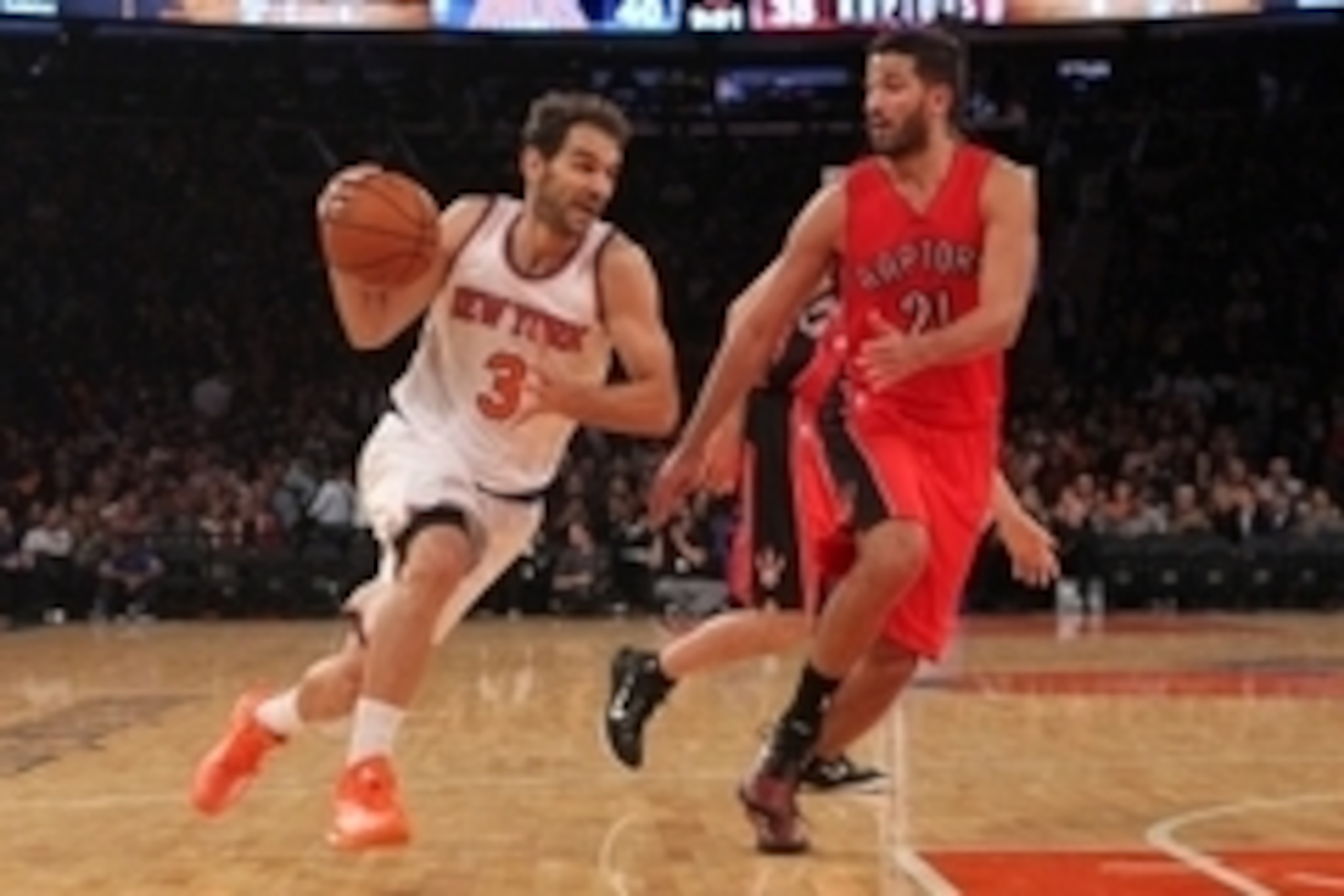 Oct 13, 2014; New York, NY, USA; New York Knicks point guard Jose Calderon (3) drives on Toronto Raptors point guard Greivis Vasquez (21) during the third quarter at Madison Square Garden. Mandatory Credit: Brad Penner-USA TODAY Sports
