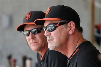 Giants pitching coach Dave Righetti (left) and manager Bruce Bochy will stay on top of Bumgarner's workload in 2015.