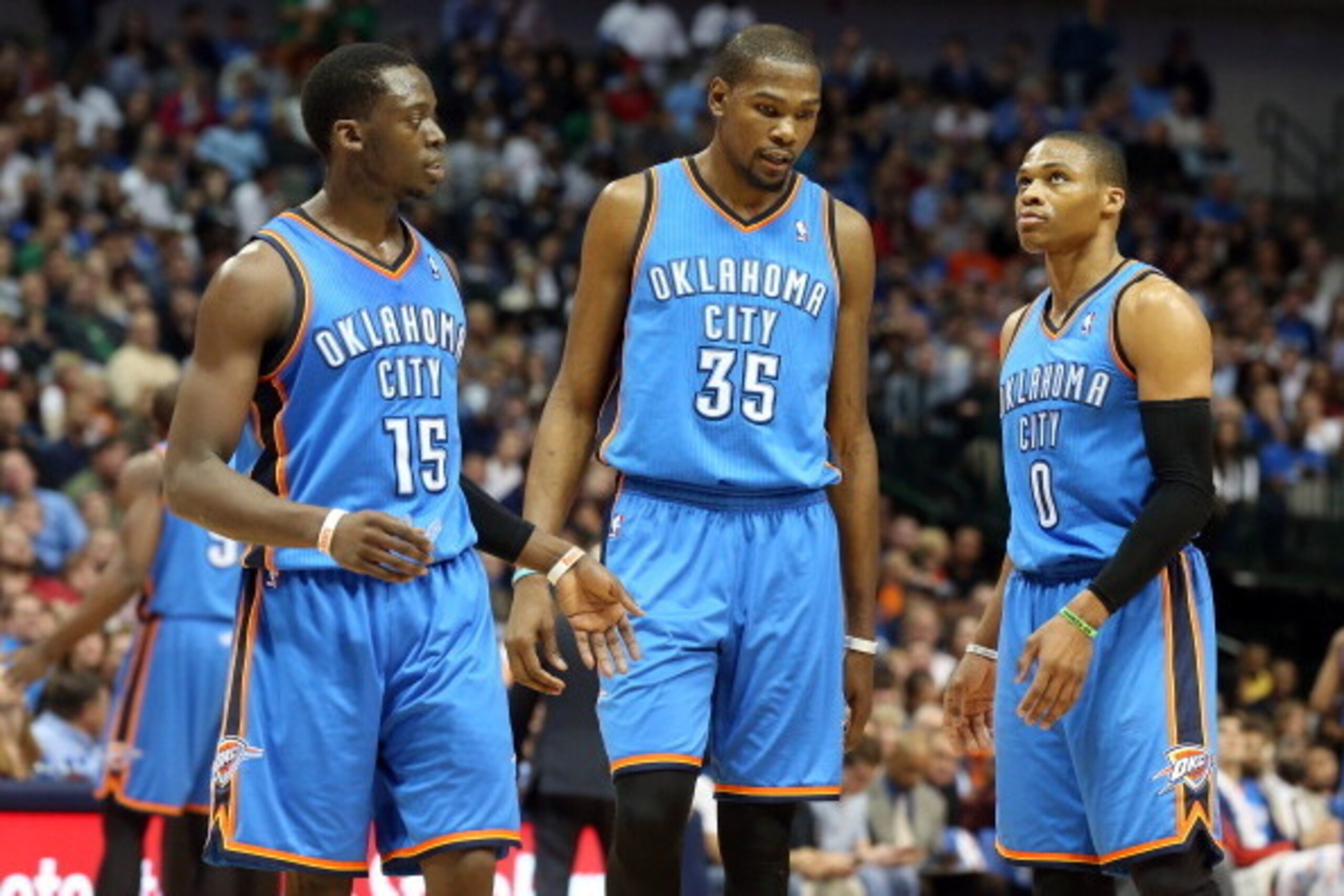 DALLAS, TX - MARCH 25:  (L-R) Reggie Jackson #15, Kevin Durant #35, and Russell Westbrook #0 of the Oklahoma City Thunder during the game against the Dallas Mavericks on March 25, 2014 at the American Airlines Center in Dallas, Texas. NOTE TO USER: User e