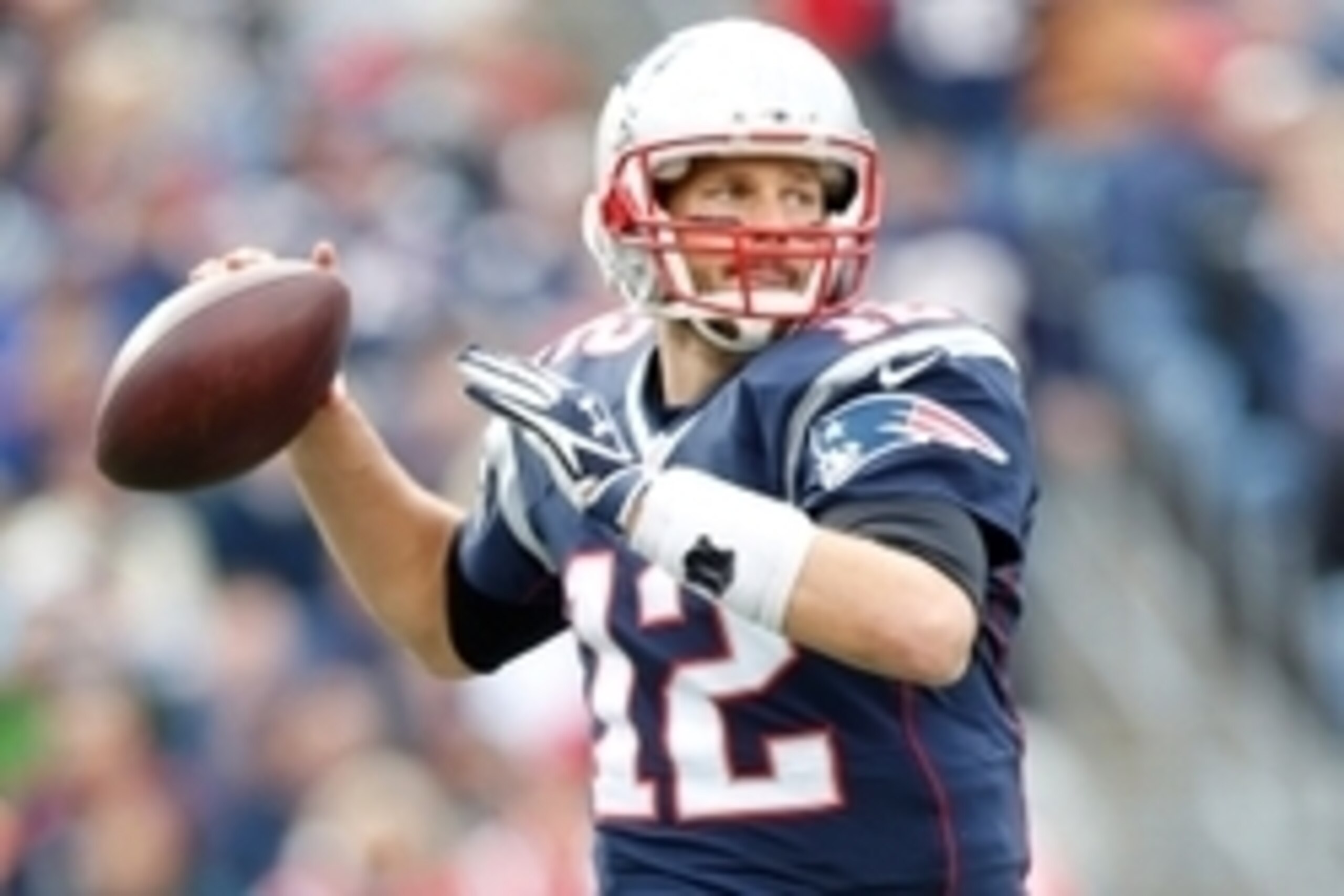 Oct 26, 2014; Foxborough, MA, USA; New England Patriots quarterback Tom Brady (12) prepares to throw the ball during the second quarter against the Chicago Bears at Gillette Stadium. Mandatory Credit: Greg M. Cooper-USA TODAY Sports
