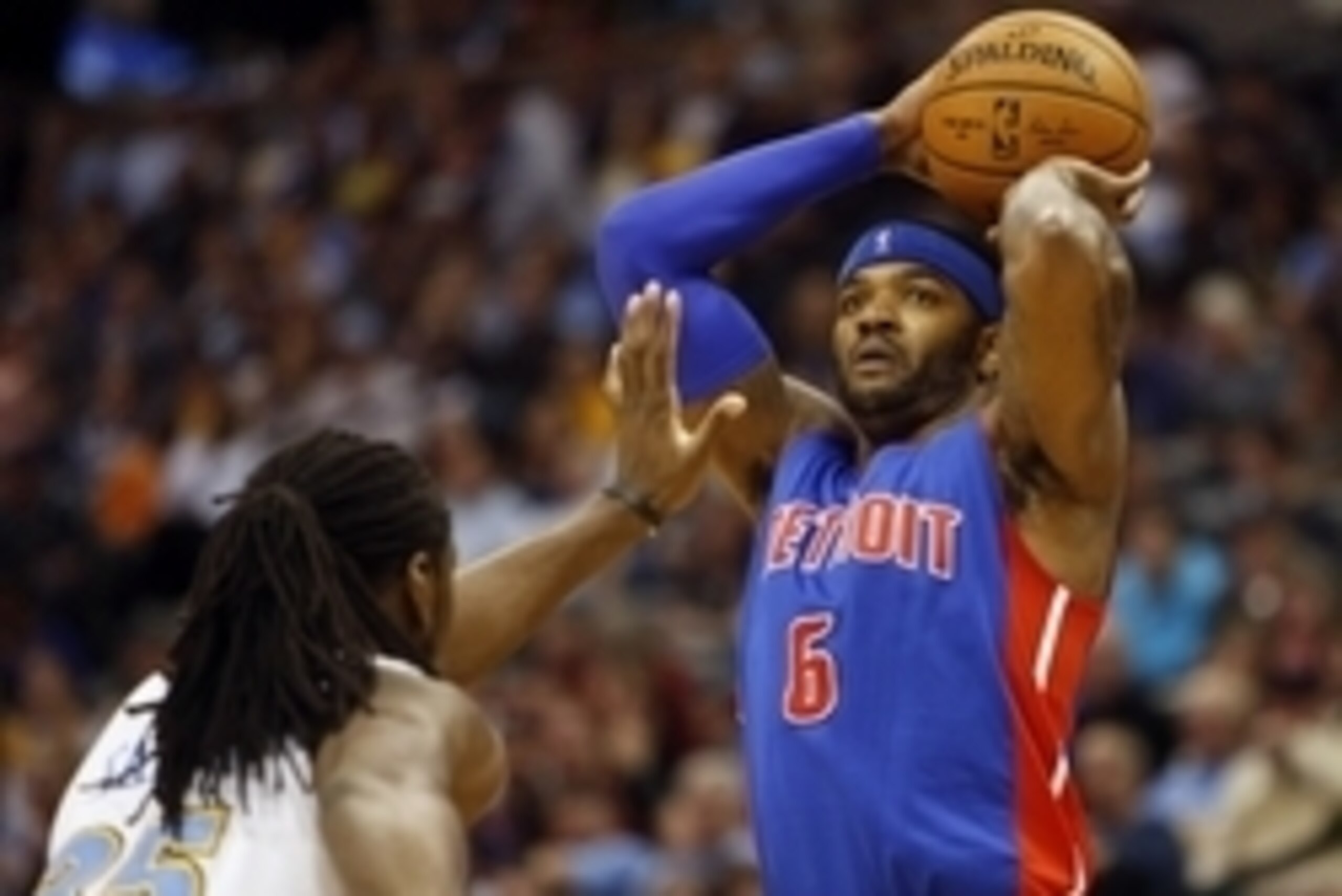 Oct 29, 2014; Denver, CO, USA; Detroit Pistons forward Josh Smith (6) shoots the ball over Denver Nuggets forward Kenneth Faried (35) during the second half at Pepsi Center. The Nuggets won 89-79.  Mandatory Credit: Chris Humphreys-USA TODAY Sports