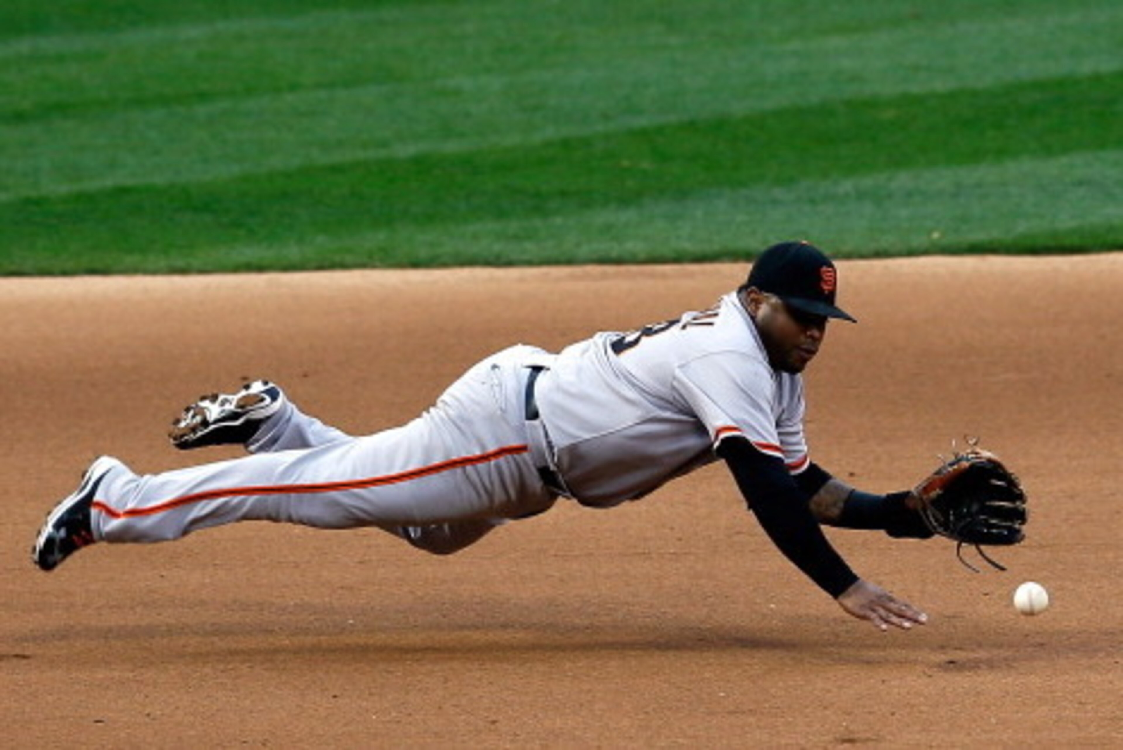 ST LOUIS, MO - OCTOBER 17:  Pablo Sandoval #48 of the San Francisco Giants fields the ball in the fifth inning on a ball hit by Kyle Lohse #26 of the St. Louis Cardinals in Game Three of the National League Championship Series at Busch Stadium on October 