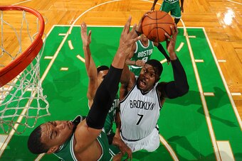 BOSTON, MA - OCTOBER 29: Joe Johnson #7 of the Brooklyn Nets shoots against the Boston Celtics on October 29, 2014 at the TD Garden in Boston, Massachusetts.  NOTE TO USER: User expressly acknowledges and agrees that, by downloading and or using this phot