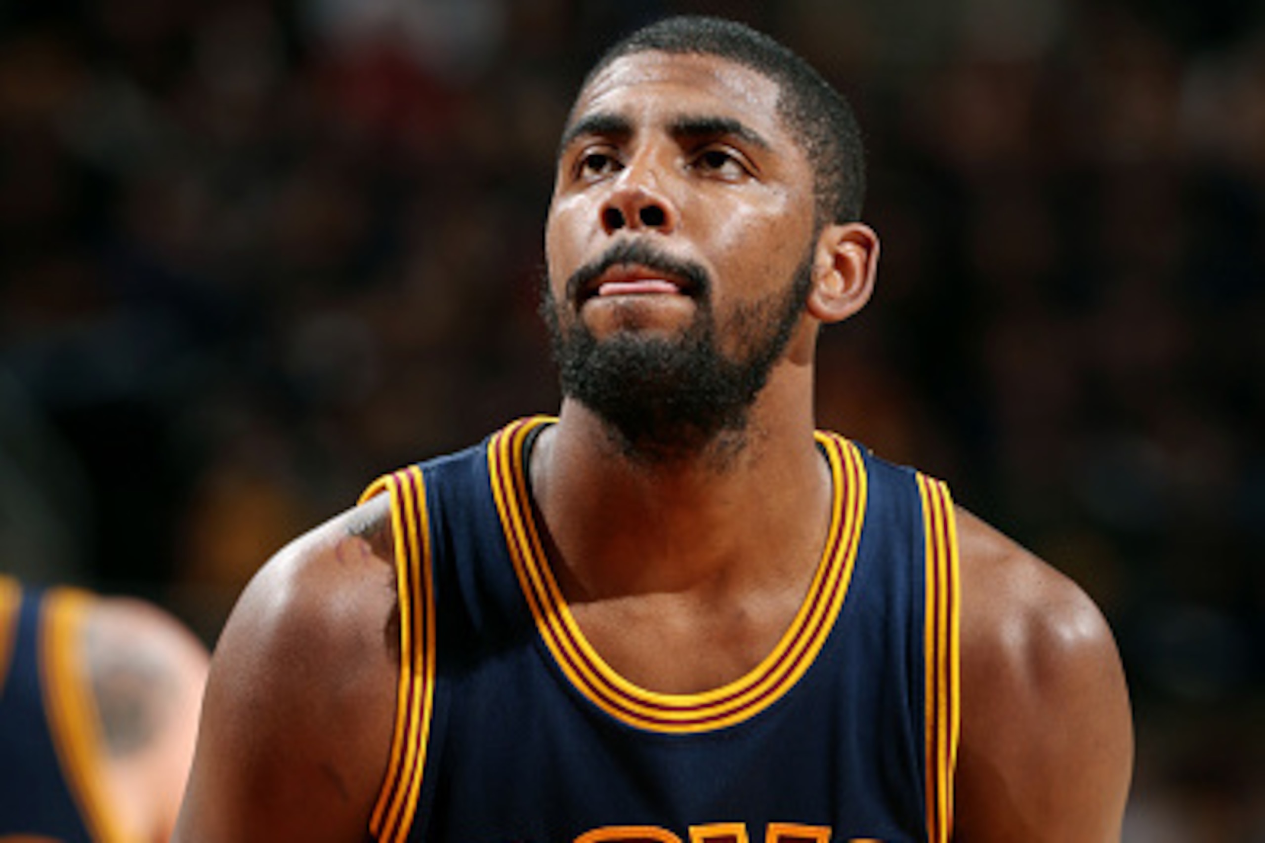 CLEVELAND, OH - OCTOBER 30: Kyrie Irving #2 of the Cleveland Cavaliers attempts a free throw against the New York Knicks on October 30, 2014 in Cleveland, Ohio. NOTE TO USER: User expressly acknowledges and agrees that, by downloading and/or using this ph