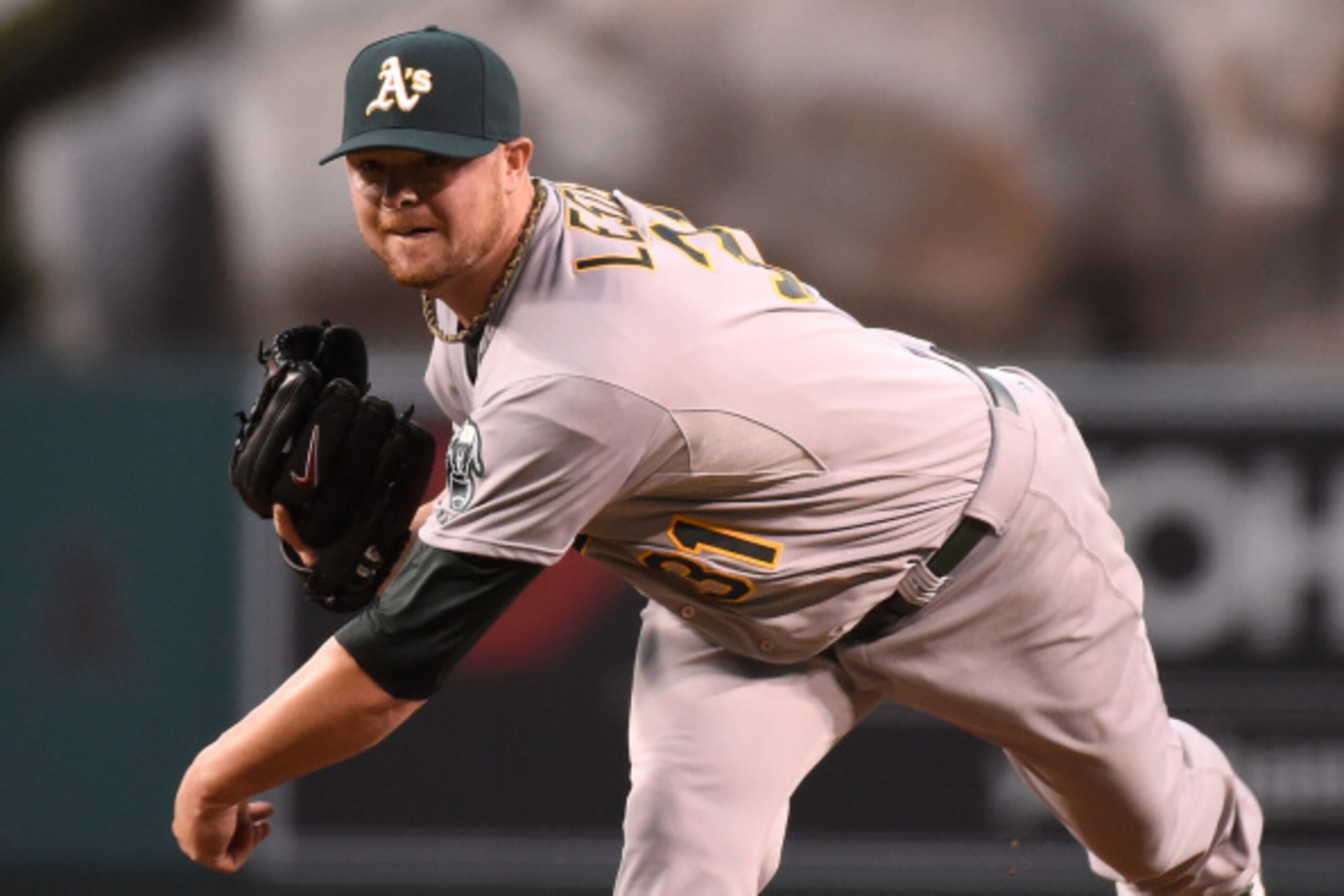 ANAHEIM, CA - AUGUST 29:  Jon Lester #31 of the Oakland Athletics pitches in the first inning against the Los Angeles Angels of Anaheim at Angel Stadium of Anaheim on August 29, 2014 in Anaheim, California.  (Photo by Lisa Blumenfeld/Getty Images)