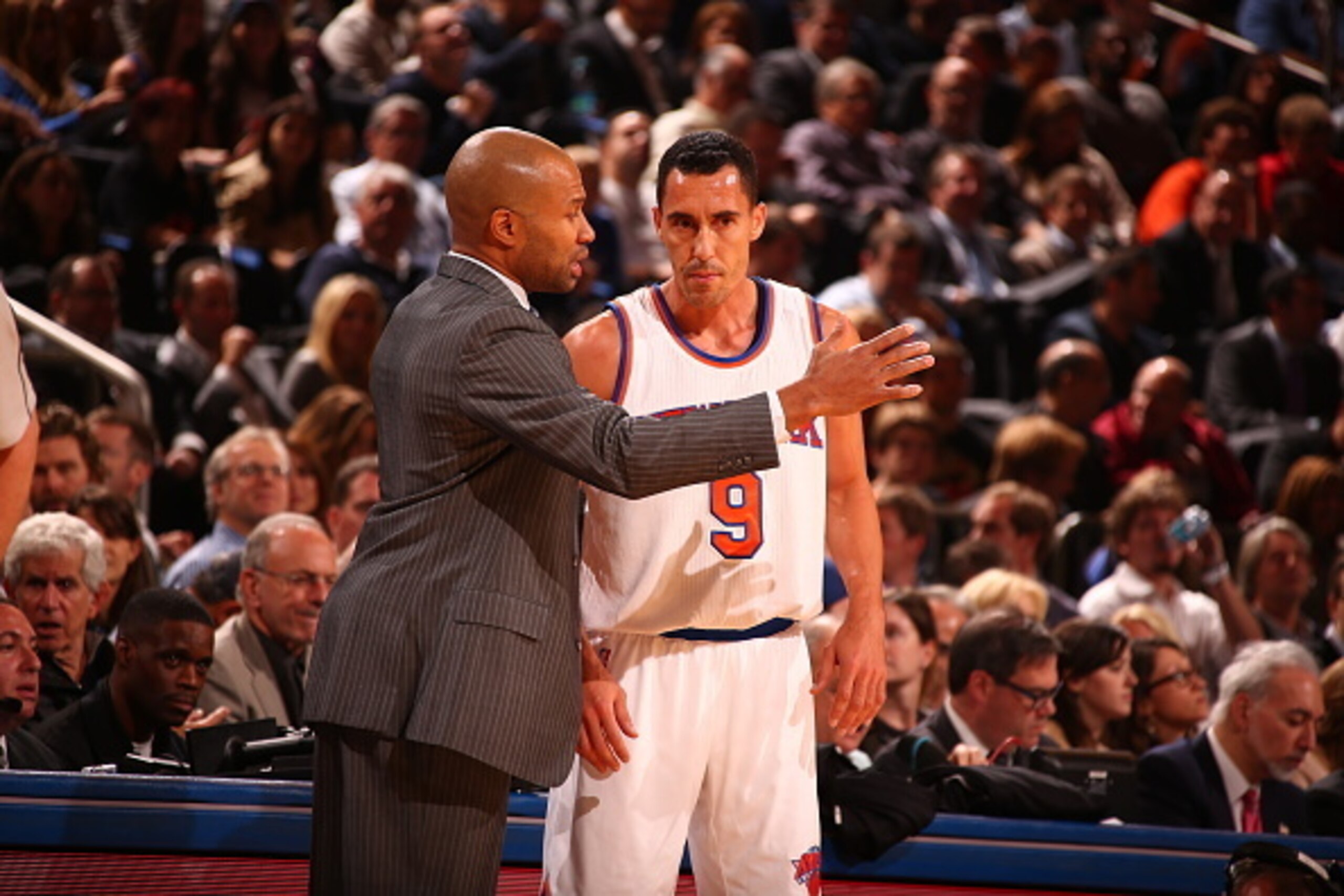 NEW YORK, NY - OCTOBER 29:  Head coach Derek Fisher of the New York Knicks talks with Pablo Prigioni #9 during a game against the Chicago Bulls at Madison Square Garden in New York City on October 29, 2014.  NOTE TO USER: User expressly acknowledges and a