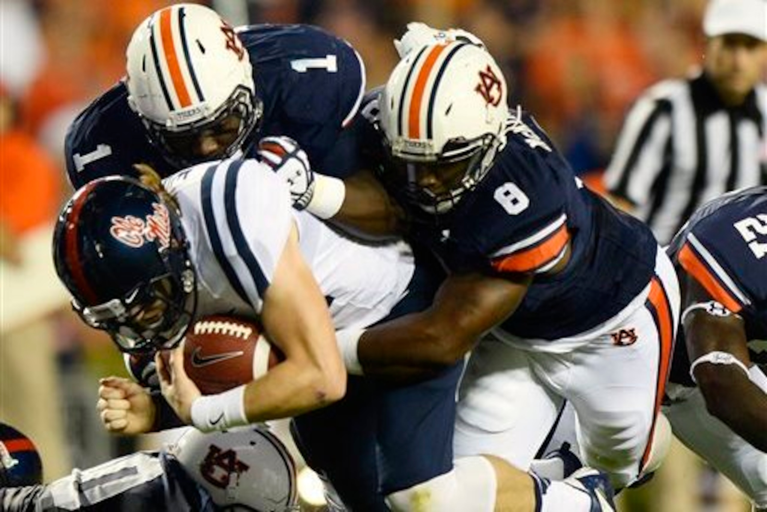 Auburn DT Montravius Adams, Auburn LB Cassanova McKinzy and Ole Miss QB Bo Wallace