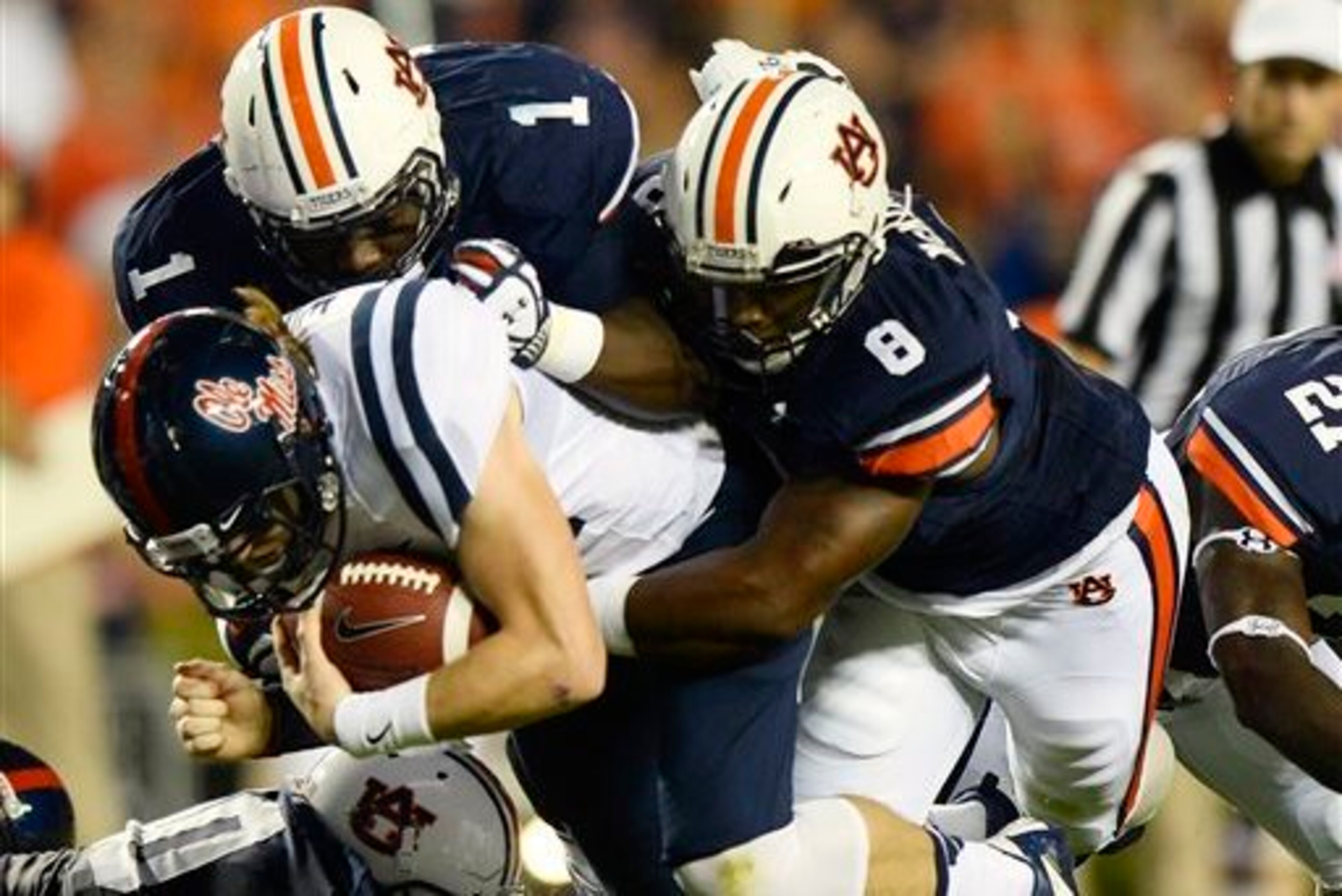 Auburn DT Montravius Adams, Auburn LB Cassanova McKinzy and Ole Miss QB Bo Wallace