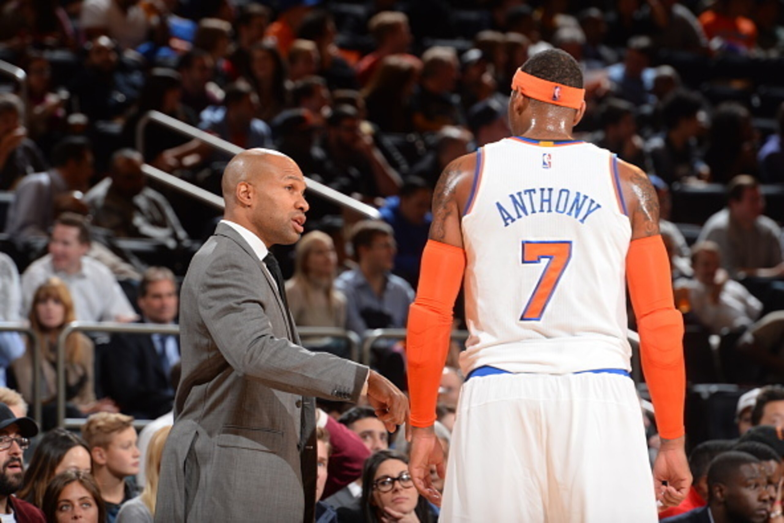NEW YORK, NY - OCTOBER 20:  Head Coach Derek Fisher of the New York Knicks speaks with Carmelo Anthony #7 during the game against the Milwaukee Bucks on October 20, 2014 at Madison Square Garden in New York City. NOTE TO USER: User expressly acknowledges 