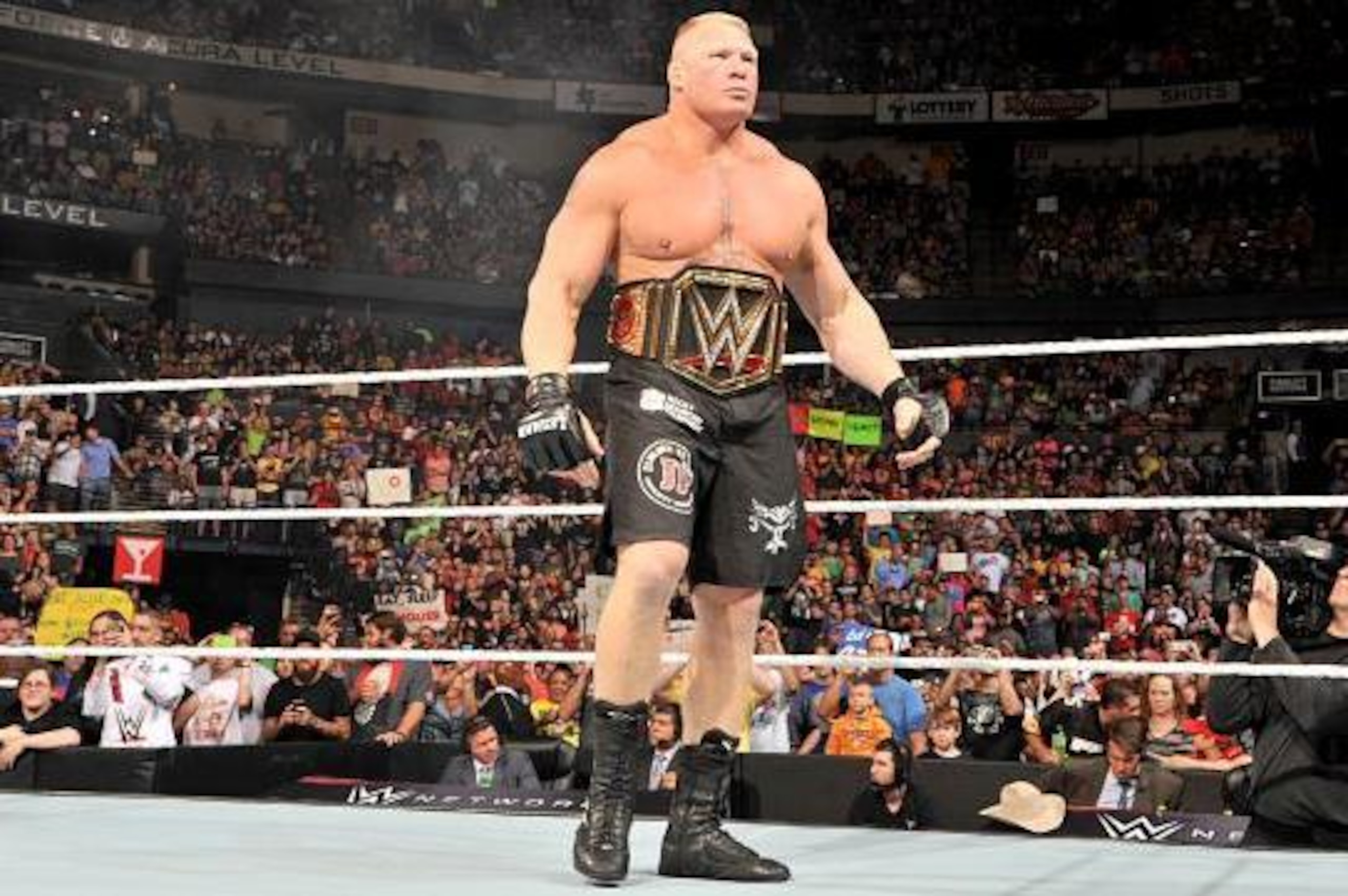 Lesnar with the WWE World Heavyweight Championship