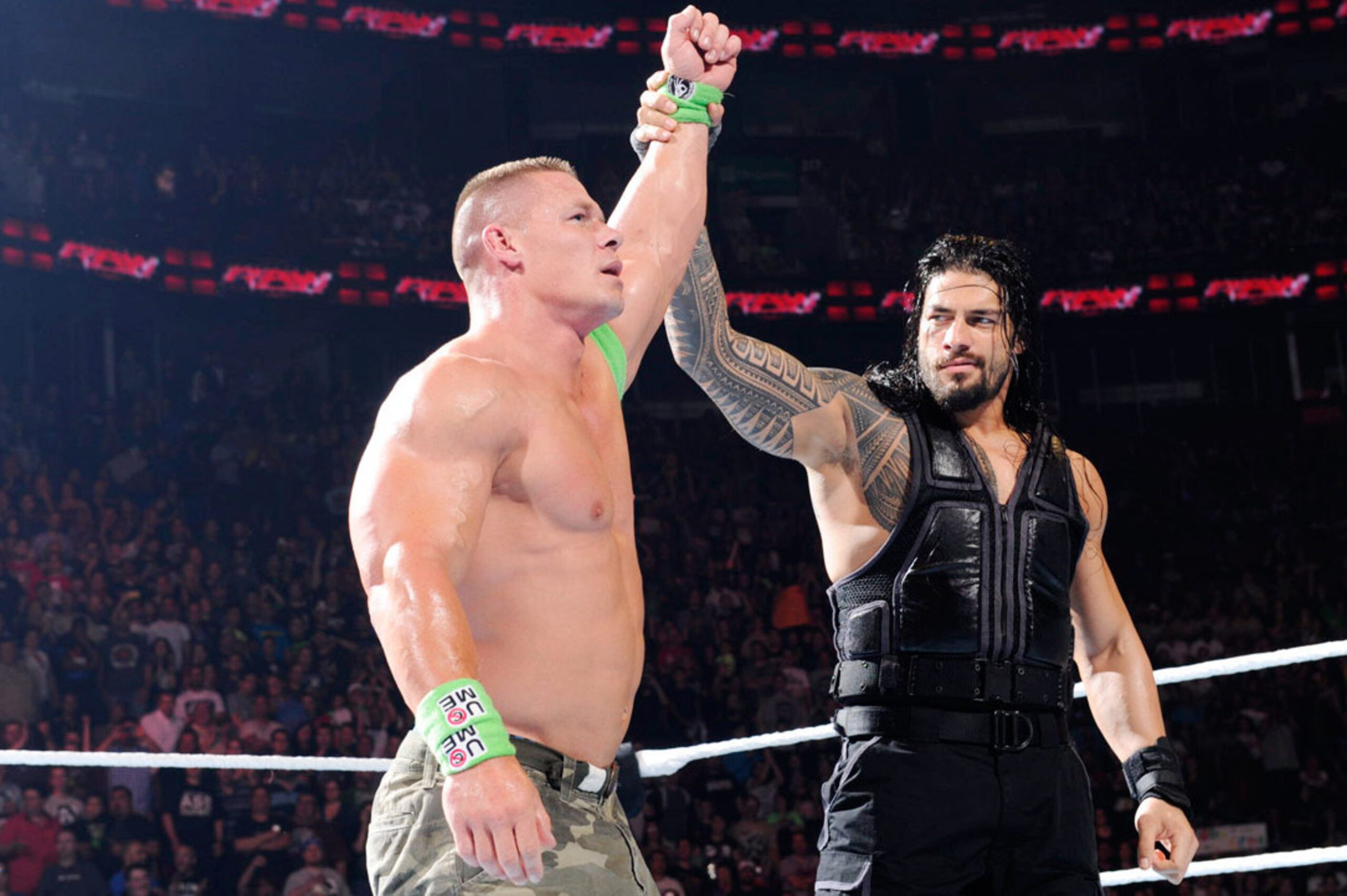 Roman Reigns with John Cena