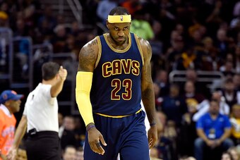 CLEVELAND, OH - OCTOBER 30:  LeBron James #23 of the Cleveland Cavaliers looks on after a play in the second quarter against the New York Knicks at Quicken Loans Arena on October 30, 2014 in Cleveland, Ohio. NOTE TO USER: User expressly acknowledges and a