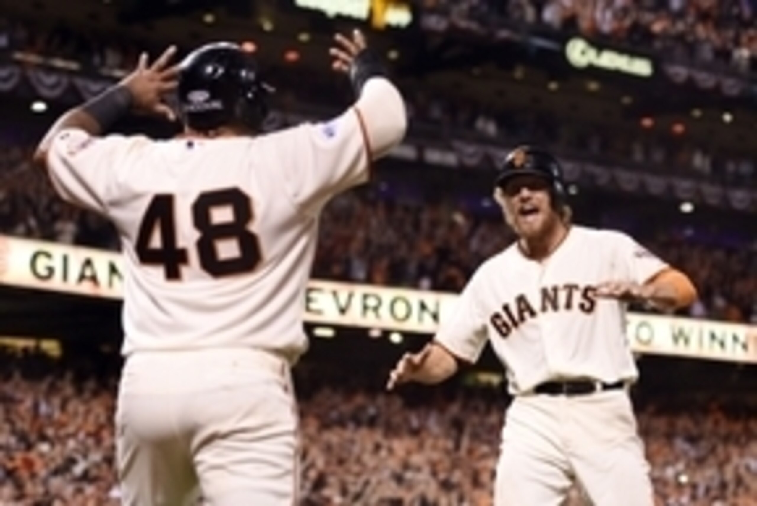 Oct 26, 2014; San Francisco, CA, USA; San Francisco Giants third baseman Pablo Sandoval (48) and right fielder Hunter Pence (right) celebrate after both scoring runs on a double by left fielder Juan Perez (not pictured) in the 8th inning against the Kansa Oct 26, 2014; San Francisco, CA, USA; San Francisco Giants third baseman Pablo Sandoval (48) and right fielder Hunter Pence (right) celebrate after both scoring runs on a double by left fielder Juan Perez (not pictured) in the 8th inning against the Kansa