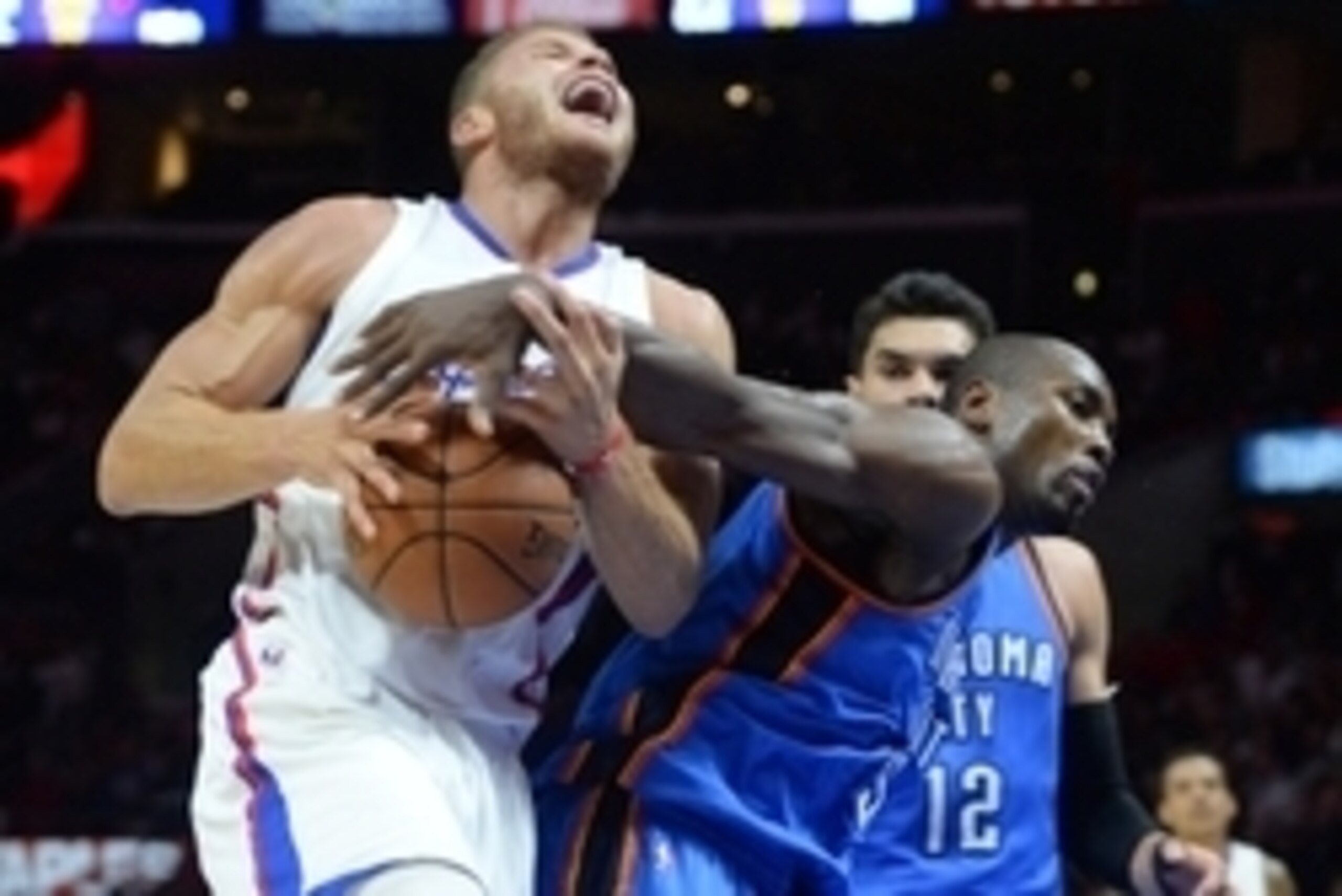 Oct 30, 2014; Los Angeles, CA, USA;     Los Angeles Clippers forward Blake Griffin (32) is fouled by Oklahoma City Thunder forward Serge Ibaka (9) in the second half of the game at Staples Center. Clippers won 93-90. Mandatory Credit: Jayne Kamin-Oncea-US