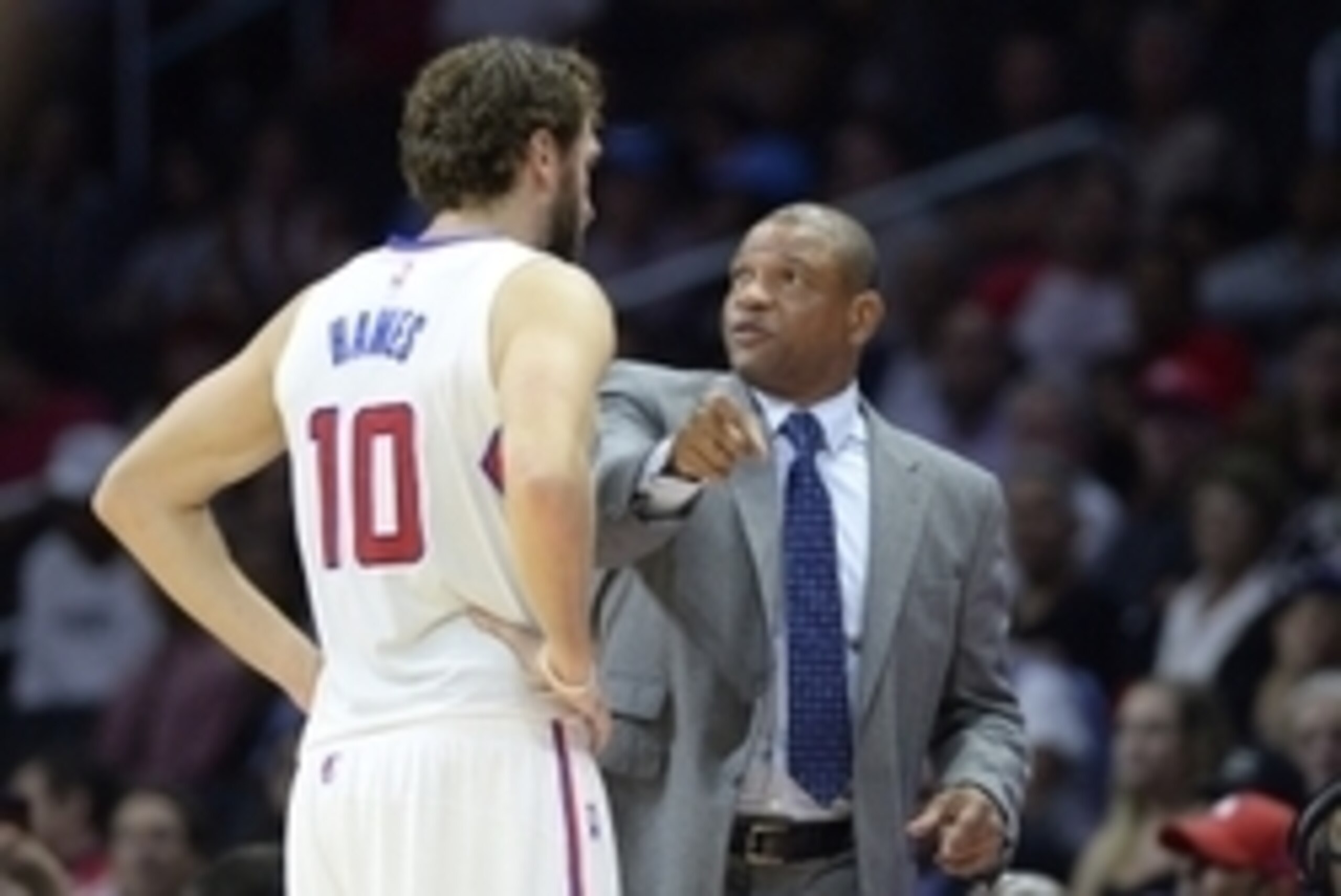 Oct 22, 2014; Los Angeles, CA, USA; Los Angeles Clippers head coach Doc Rivers talks to forward Spencer Hawes (10) during the second half against the Phoenix Suns at Staples Center. Mandatory Credit: Richard Mackson-USA TODAY Sports