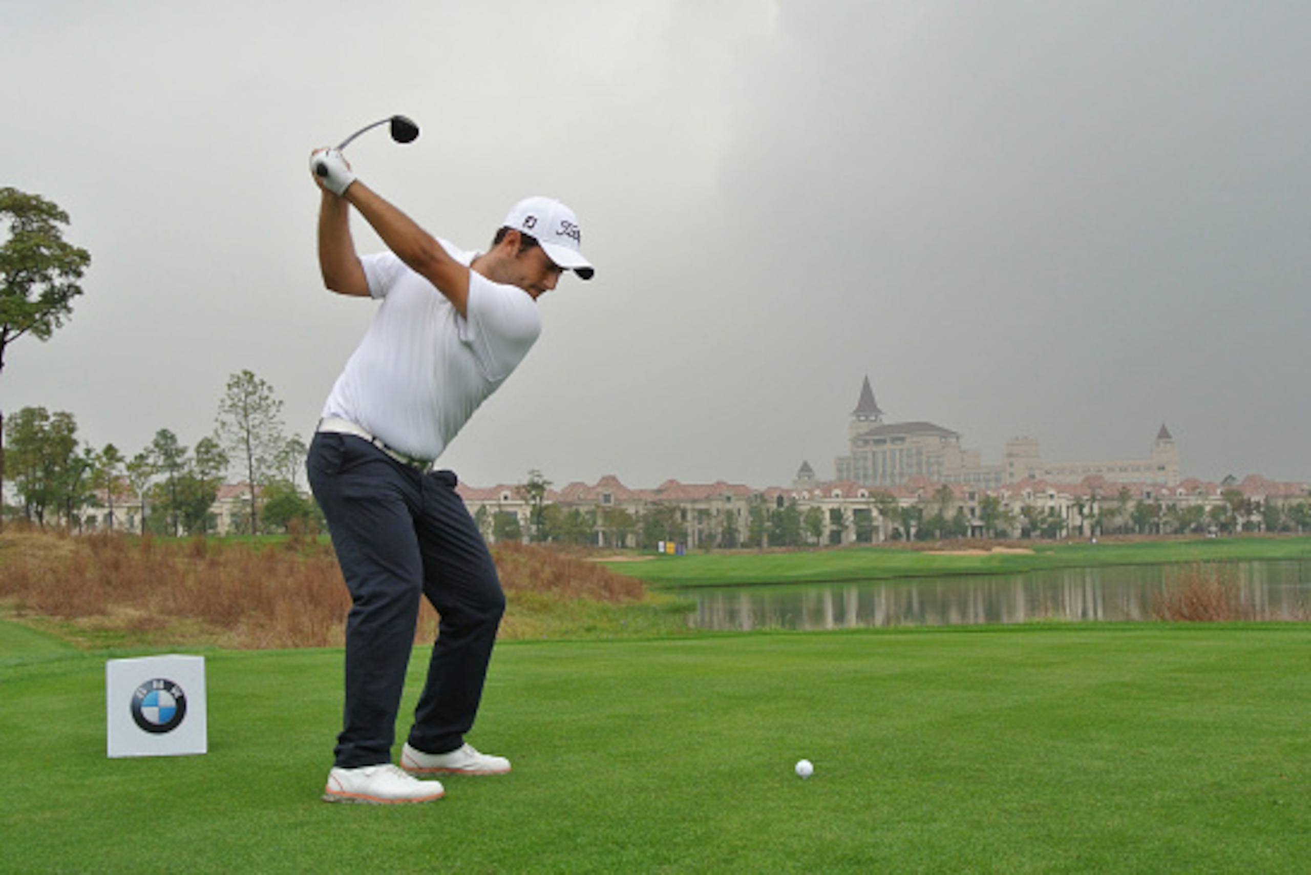 SHANGHAI, CHINA - OCTOBER 31:  Alexander Levy of France hits his tee-shot on the ninth hole during the second round of the BMW Masters at Lake Malaren Golf Club on October 31, 2014 in Shanghai, China.  (Photo by Andrew Redington/Getty Images)