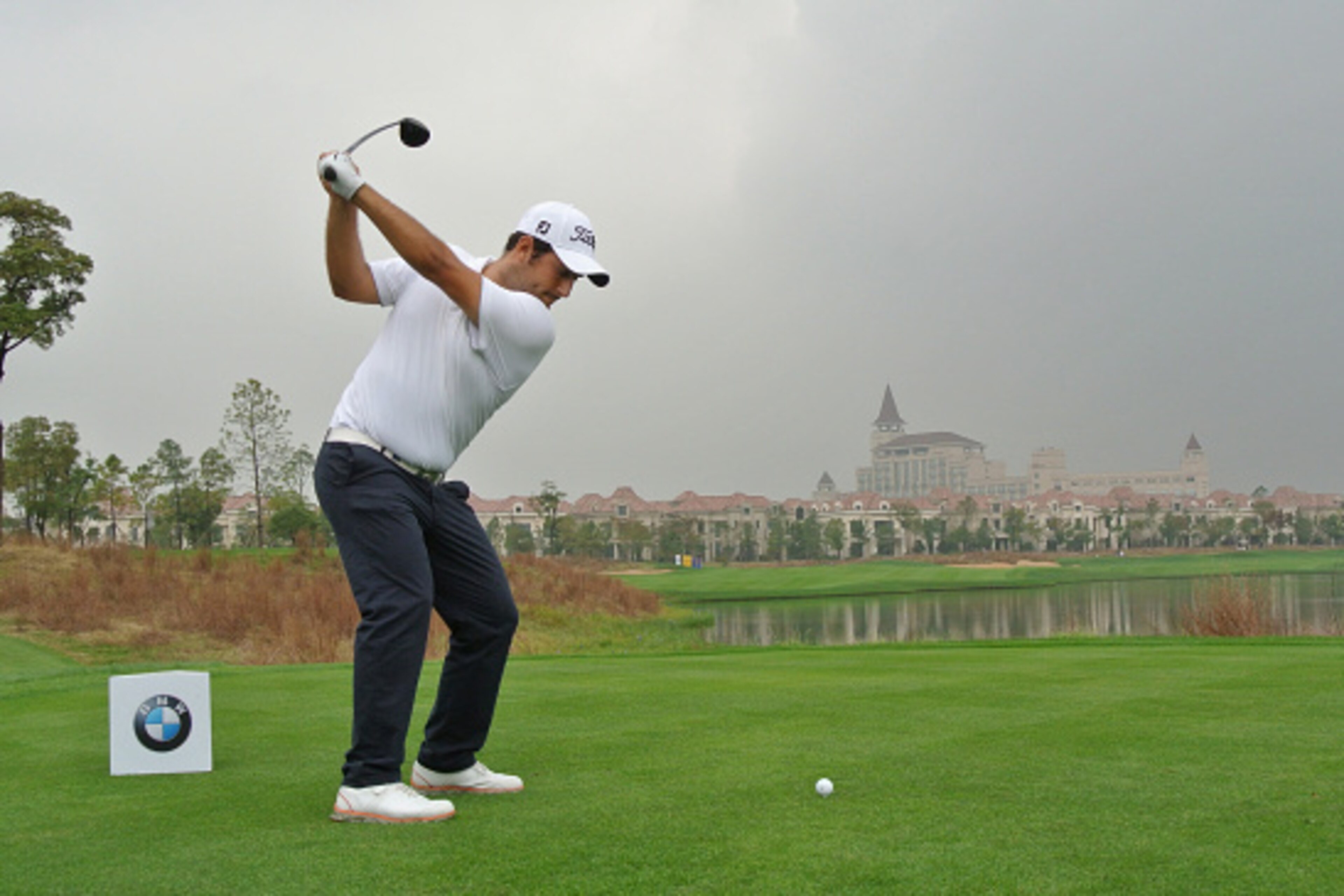SHANGHAI, CHINA - OCTOBER 31:  Alexander Levy of France hits his tee-shot on the ninth hole during the second round of the BMW Masters at Lake Malaren Golf Club on October 31, 2014 in Shanghai, China.  (Photo by Andrew Redington/Getty Images)