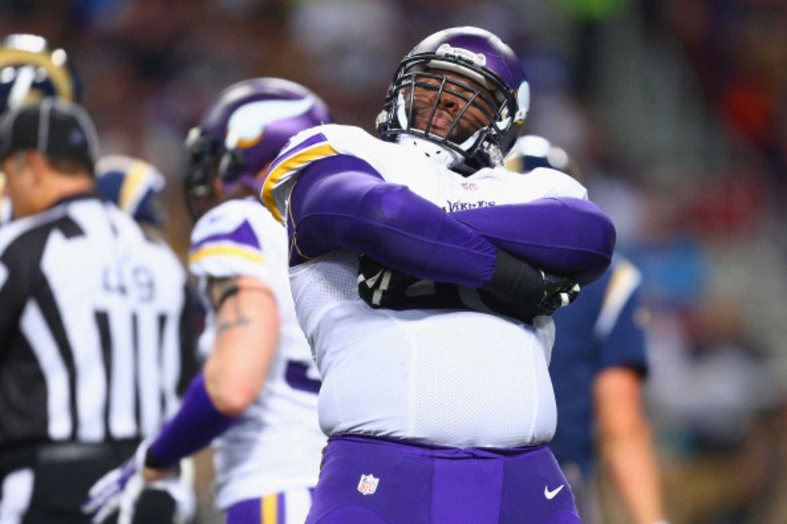 ST. LOUIS, MO - SEPTEMBER 7: Linval Joseph #98 of the Minnesota Vikings celebrate after sacking Austin Davis #9 of the St. Louis Rams at the Edward Jones Dome on September 7, 2014 in St. Louis, Missouri.  The Vikings beat the Rams 34-6.  (Photo by Dilip V