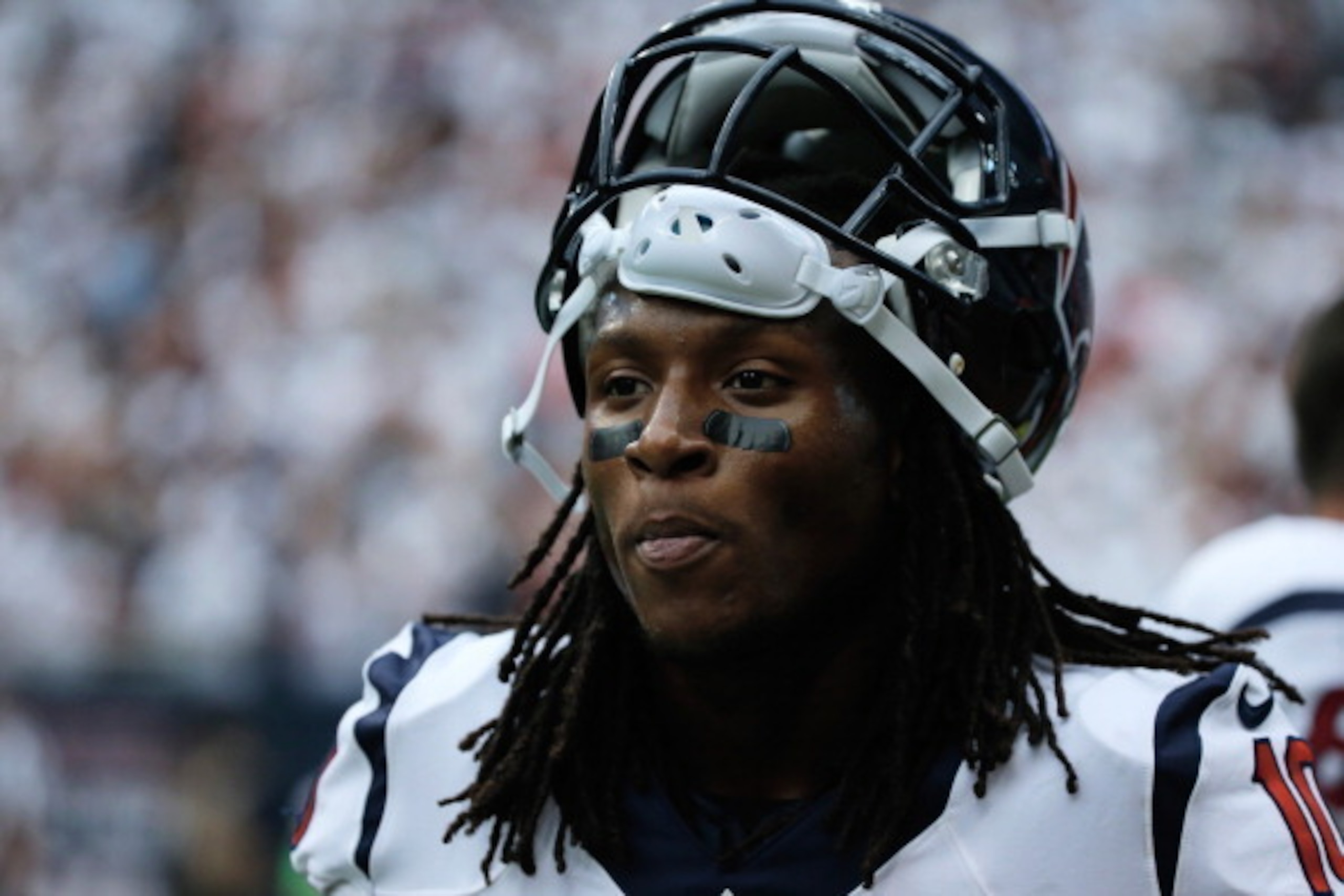 HOUSTON, TX - SEPTEMBER 15:  DeAndre Hopkins #10 of the Houston Texans walks off the field during the game against the Tennessee Titans for a pass completion in overtime at Reliant Stadium on September 15, 2013 in Houston, Texas.  (Photo by Scott Halleran