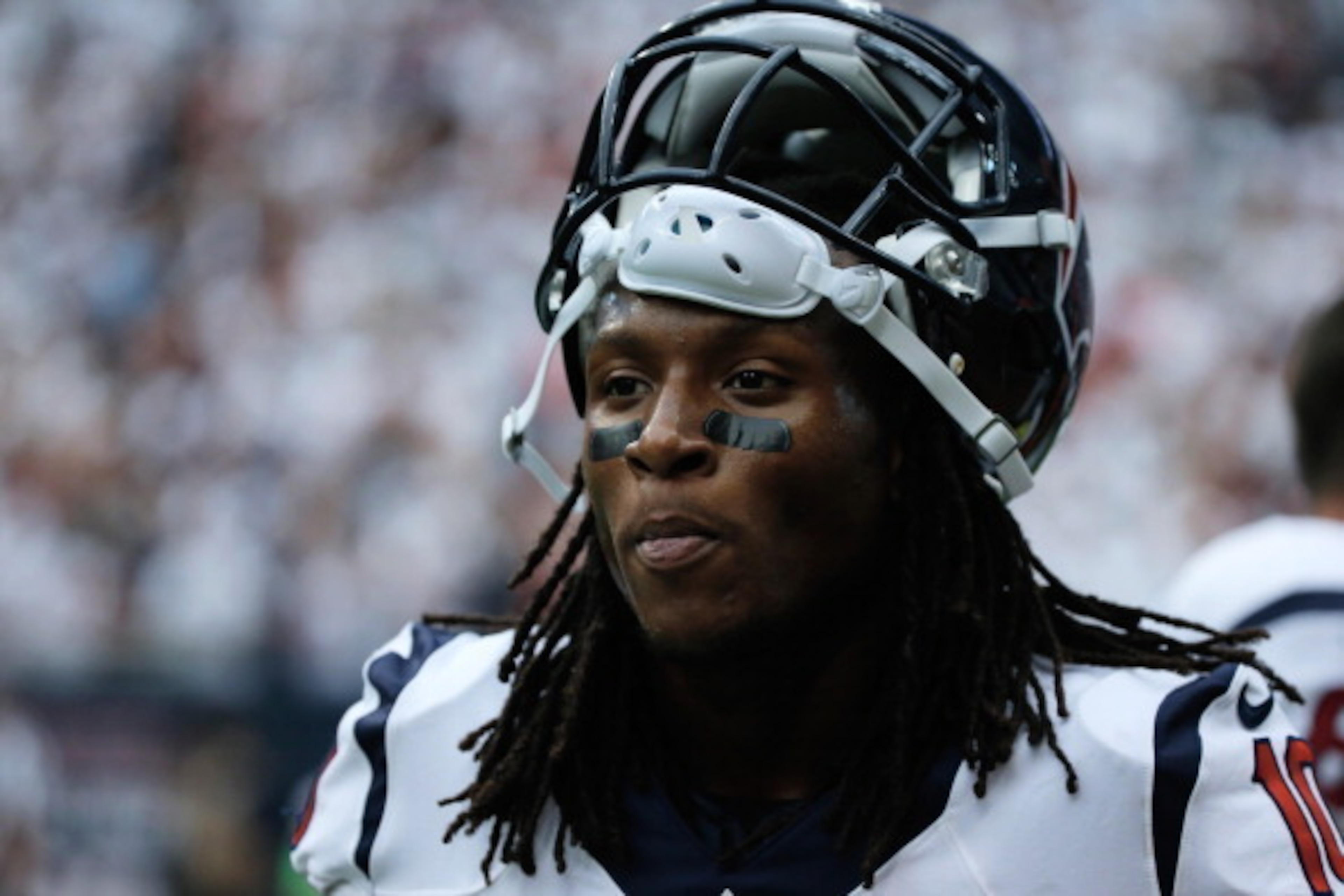HOUSTON, TX - SEPTEMBER 15:  DeAndre Hopkins #10 of the Houston Texans walks off the field during the game against the Tennessee Titans for a pass completion in overtime at Reliant Stadium on September 15, 2013 in Houston, Texas.  (Photo by Scott Halleran